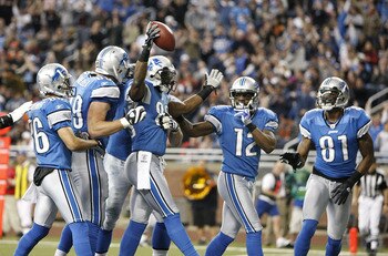 DETROIT - JANUARY 03: Bryant Johnson #80 of the Detroit Lions celebrates a second quarter touchdown with Calvin Johnson #81 and Derrick Williams #12 while playing the Chicago Bears on January 3, 2010 at Ford Field in Detroit, Michigan.  (Photo by Gregory