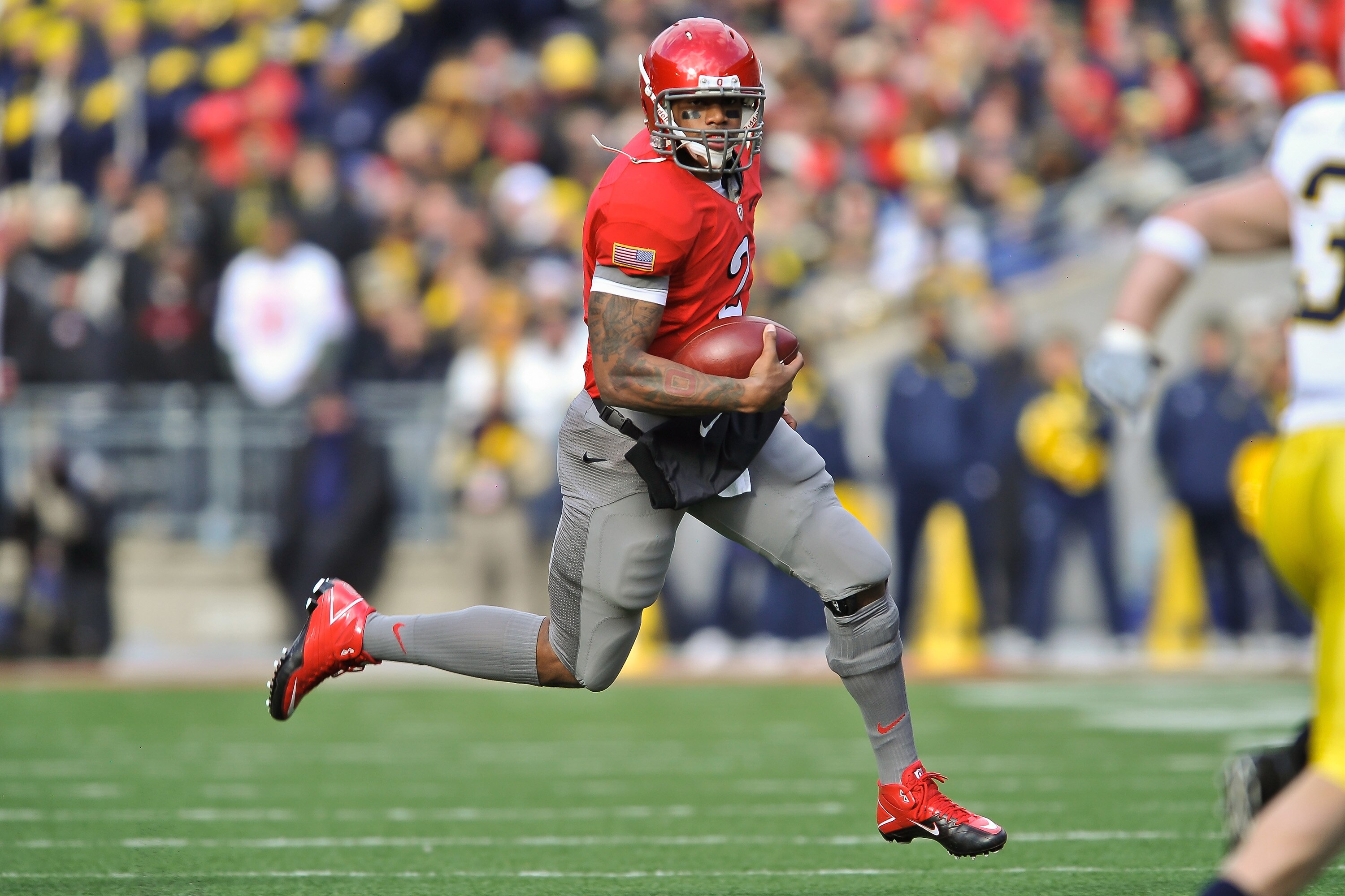 COLUMBUS, OH - NOVEMBER 27:  Quarterback Terrelle Pryor #2 of the Ohio State Buckeyes runs with the ball against the Michigan Wolverines at Ohio Stadium on November 27, 2010 in Columbus, Ohio.  (Photo by Jamie Sabau/Getty Images)