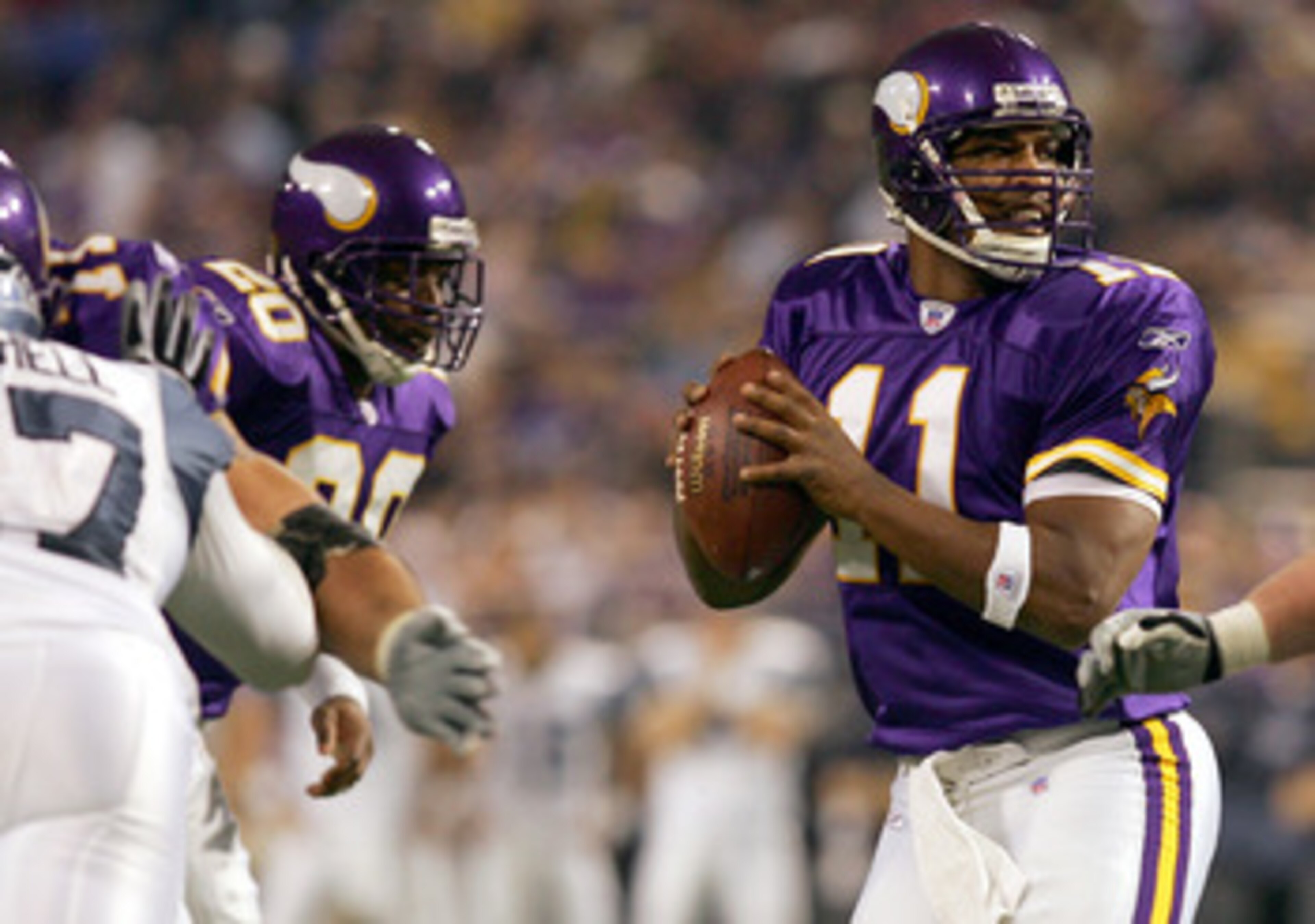 MINNEAPOLIS - DECEMBER 12: Daunte Culpepper #11 of the Minnesota Vikings looks to pass in the first half against the Seattle Seahawks on December 12, 2004 at the Hubert H. Humphrey Metrodome in Minneapolis, Minnesota. The Seattle Seahawks defeated the Min
