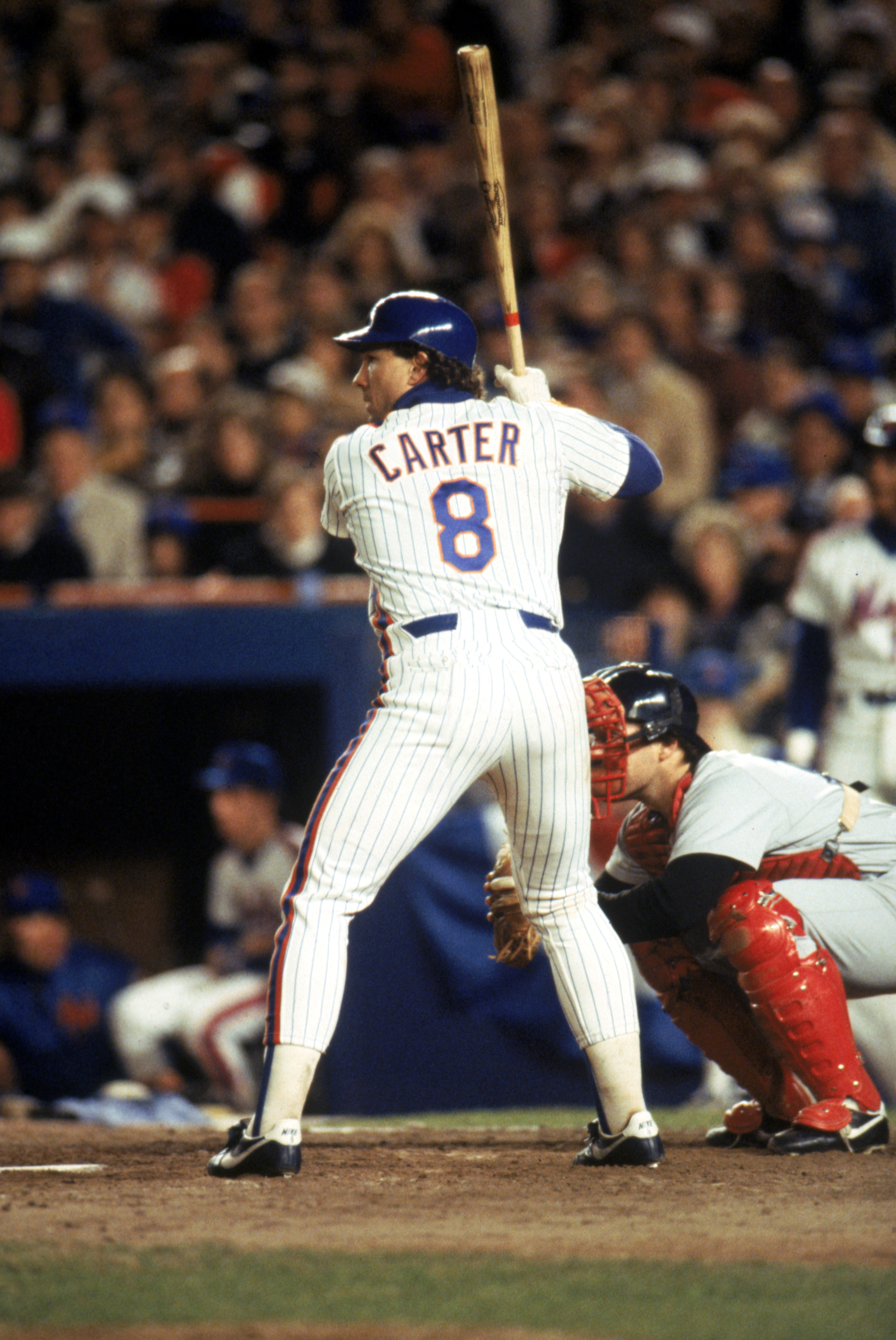 NEW YORK - 1986: Gary Carter #8 of the New York Mets readies for the pitch during the 1986 World Series game against the Boston Red Sox at Shea Stadium in New York City, New York. The Mets won 4-3. (Photo by Getty Images) NEW YORK - 1986: Gary Carter #8 of the New York Mets readies for the pitch during the 1986 World Series game against the Boston Red Sox at Shea Stadium in New York City, New York. The Mets won 4-3. (Photo by Getty Images)