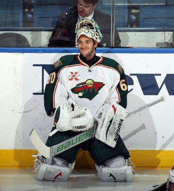 UNIONDALE, NY - MARCH 02:  Jose Theodore #60 of the Minnesota Wild tends net against the New York Islanders at the Nassau Coliseum on March 2, 2011 in Uniondale, New York. The Islanders defeated the Wild 4-1.  (Photo by Bruce Bennett/Getty Images)