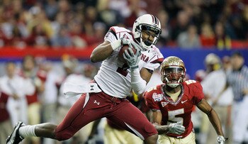 ATLANTA, GA - DECEMBER 31:  Alshon Jeffery #1 of the South Carolina Gamecocks pulls in this reception against Greg Reid #5 of the Florida State Seminoles during the 2010 Chick-fil-A Bowl at Georgia Dome on December 31, 2010 in Atlanta, Georgia.  (Photo by