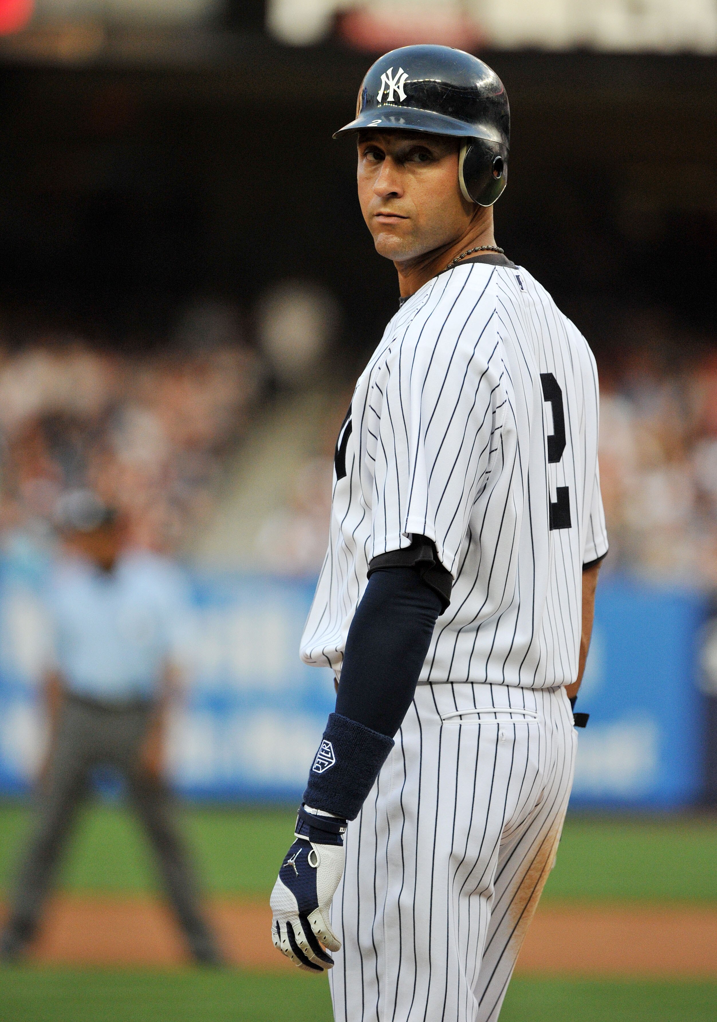 NEW YORK, NY - JUNE 10: Derek Jeter #2 of the New York Yankees  stands on third base in the bottom of the first inning against the Cleveland Indians on June 10, 2011 at Yankee Stadium in the Bronx borough of New York City. (Photo by Christopher Pasatieri/