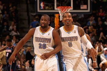 DENVER, CO - FEBRUARY 28:  Raymond Felton #20 and J.R. Smith #5 of the Denver Nuggets celebrate after connecting to score against the Atlanta Hawks during NBA action at the Pepsi Center on February 28, 2011 in Denver, Colorado. The Nuggets deafeated the H
