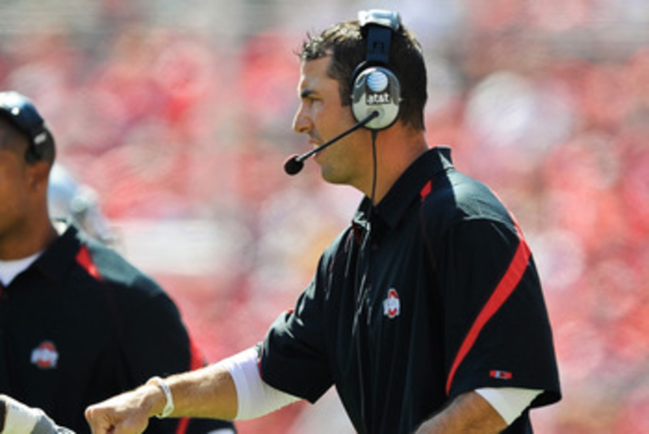 COLUMBUS, OH - SEPTEMBER 18: Assistant Coach Luke Fickell of the Ohio State Buckeyes fists pump one of his players during a game against the Ohio Bobcats at Ohio Stadium on September 18, 2010 in Columbus, Ohio. (Photo by Jamie Sabau/Getty Images) COLUMBUS, OH - SEPTEMBER 18: Assistant Coach Luke Fickell of the Ohio State Buckeyes fists pump one of his players during a game against the Ohio Bobcats at Ohio Stadium on September 18, 2010 in Columbus, Ohio. (Photo by Jamie Sabau/Getty Images)