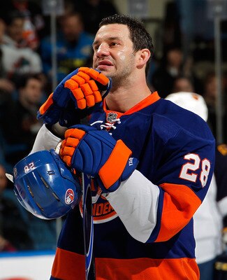 UNIONDALE, NY - MARCH 24:  Zenon Konopka #28 of the New York Islanders stands for the National Anthem before an NHL hockey game against the Atlanta Thrashers at the Nassau Coliseum on March 24, 2011 in Uniondale, New York.  (Photo by Paul Bereswill/Getty 