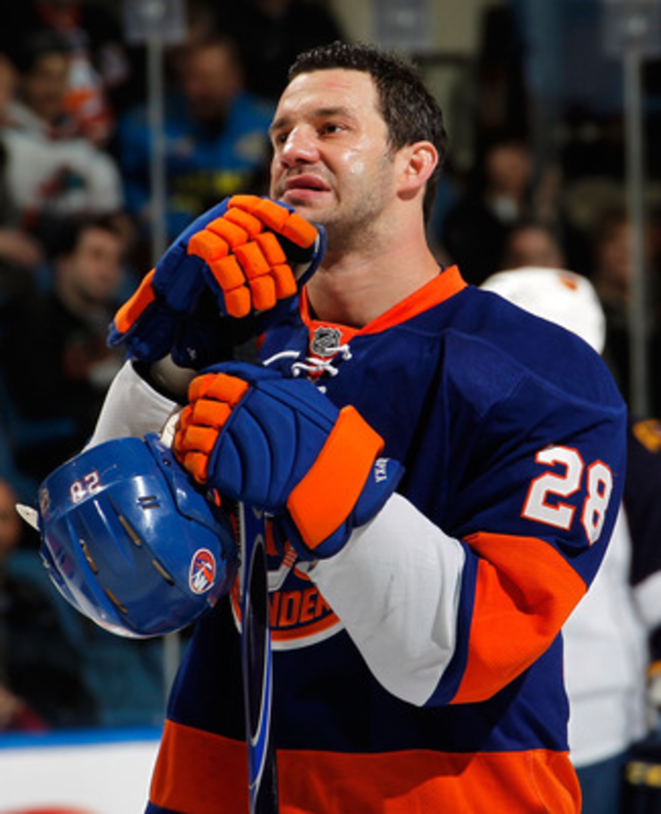 UNIONDALE, NY - MARCH 24:  Zenon Konopka #28 of the New York Islanders stands for the National Anthem before an NHL hockey game against the Atlanta Thrashers at the Nassau Coliseum on March 24, 2011 in Uniondale, New York.  (Photo by Paul Bereswill/Getty 