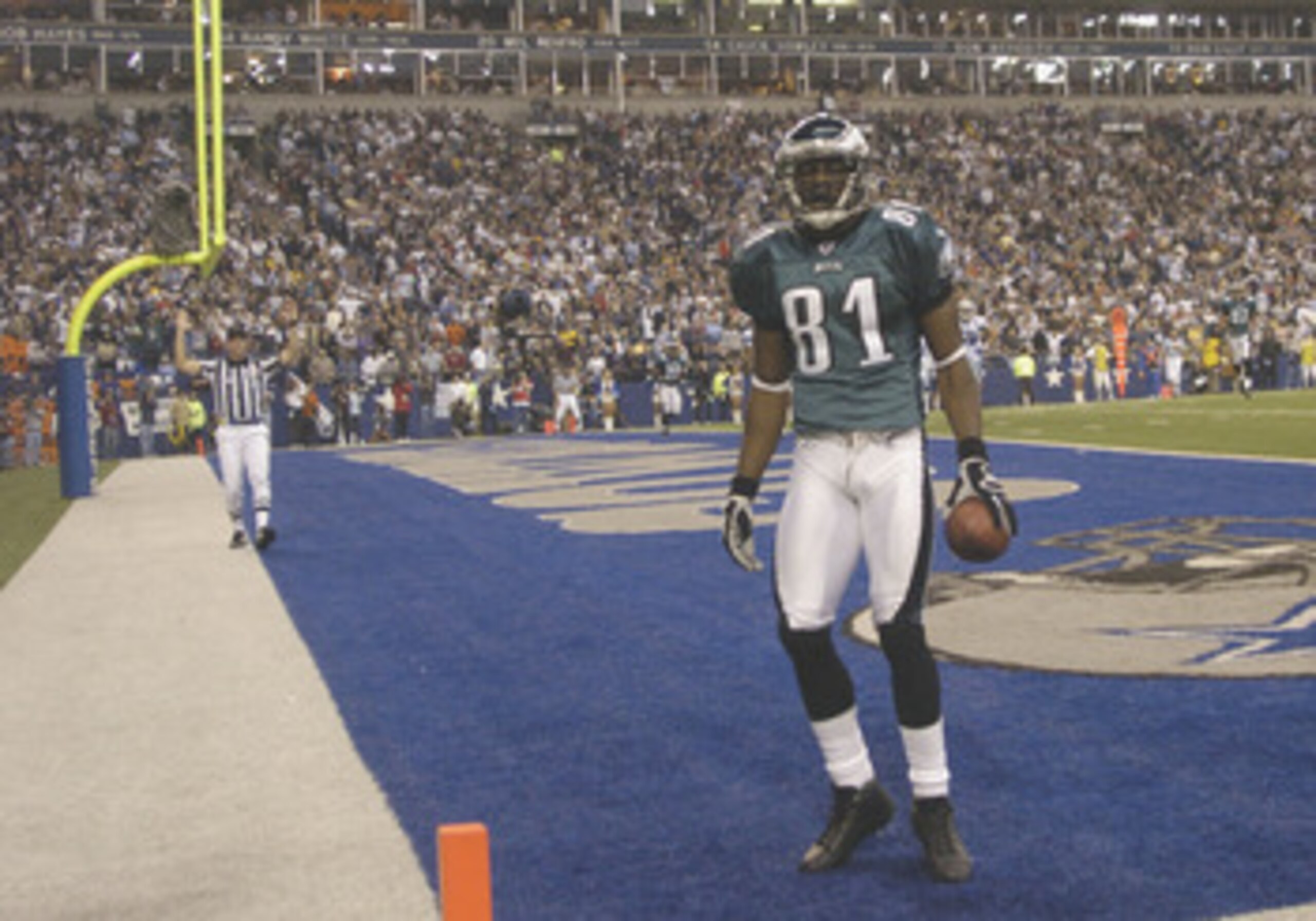 Philadephia Eagles wide receiver Terrell Owens is alone in the end zone against the Dallas Cowboys on Monday Night Football November 15, 2005 at Texas Stadium.  Owens caught six passes and socred three touchdowns.  (Photo by Al Messerschmidt/Getty Images)