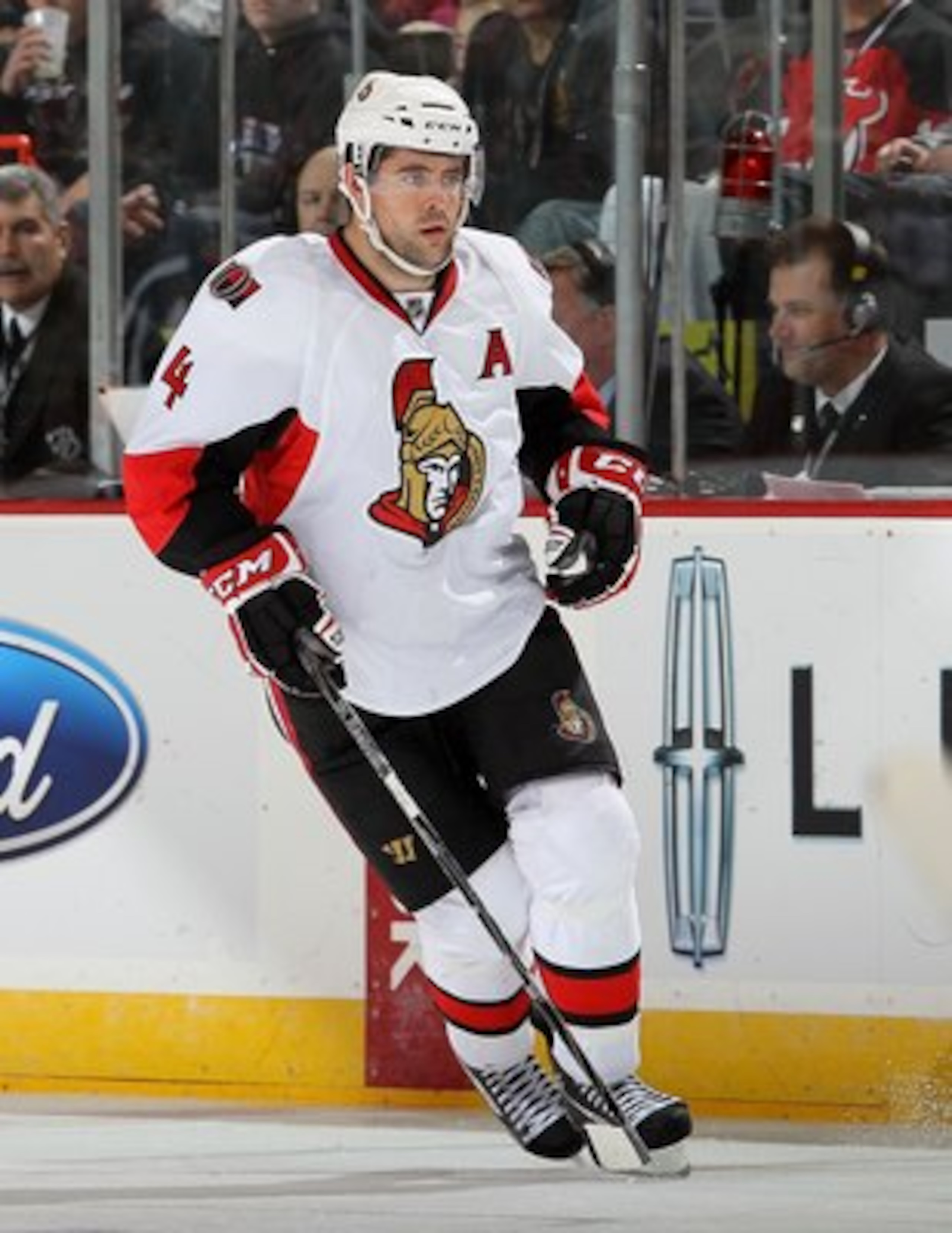 NEWARK, NJ - MARCH 08:  Chris Phillips #4 of the Ottawa Senators skates against the New Jersey Devils at the Prudential Center on March 8, 2011 in Newark, New Jersey.  (Photo by Jim McIsaac/Getty Images)
