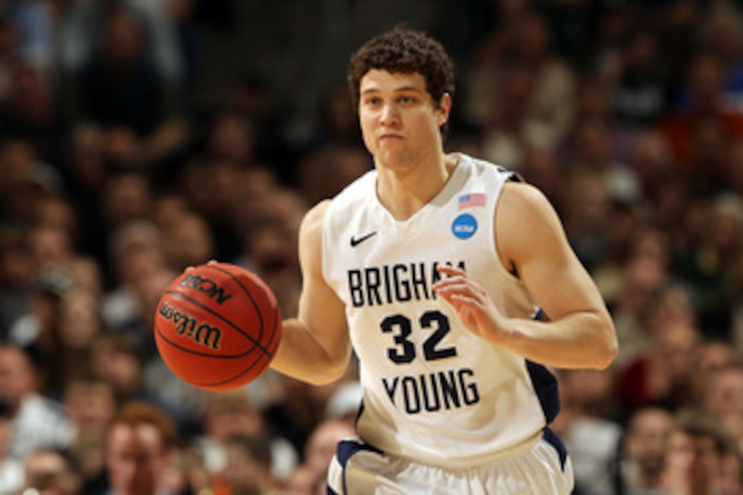 DENVER, CO - MARCH 19: Jimmer Fredette #32 of the Brigham Young Cougars handles the ball against the Gonzaga Bulldogs during the third round of the 2011 NCAA men's basketball tournament at Pepsi Center on March 19, 2011 in Denver, Colorado. (Photo by Do DENVER, CO - MARCH 19: Jimmer Fredette #32 of the Brigham Young Cougars handles the ball against the Gonzaga Bulldogs during the third round of the 2011 NCAA men's basketball tournament at Pepsi Center on March 19, 2011 in Denver, Colorado. (Photo by Do