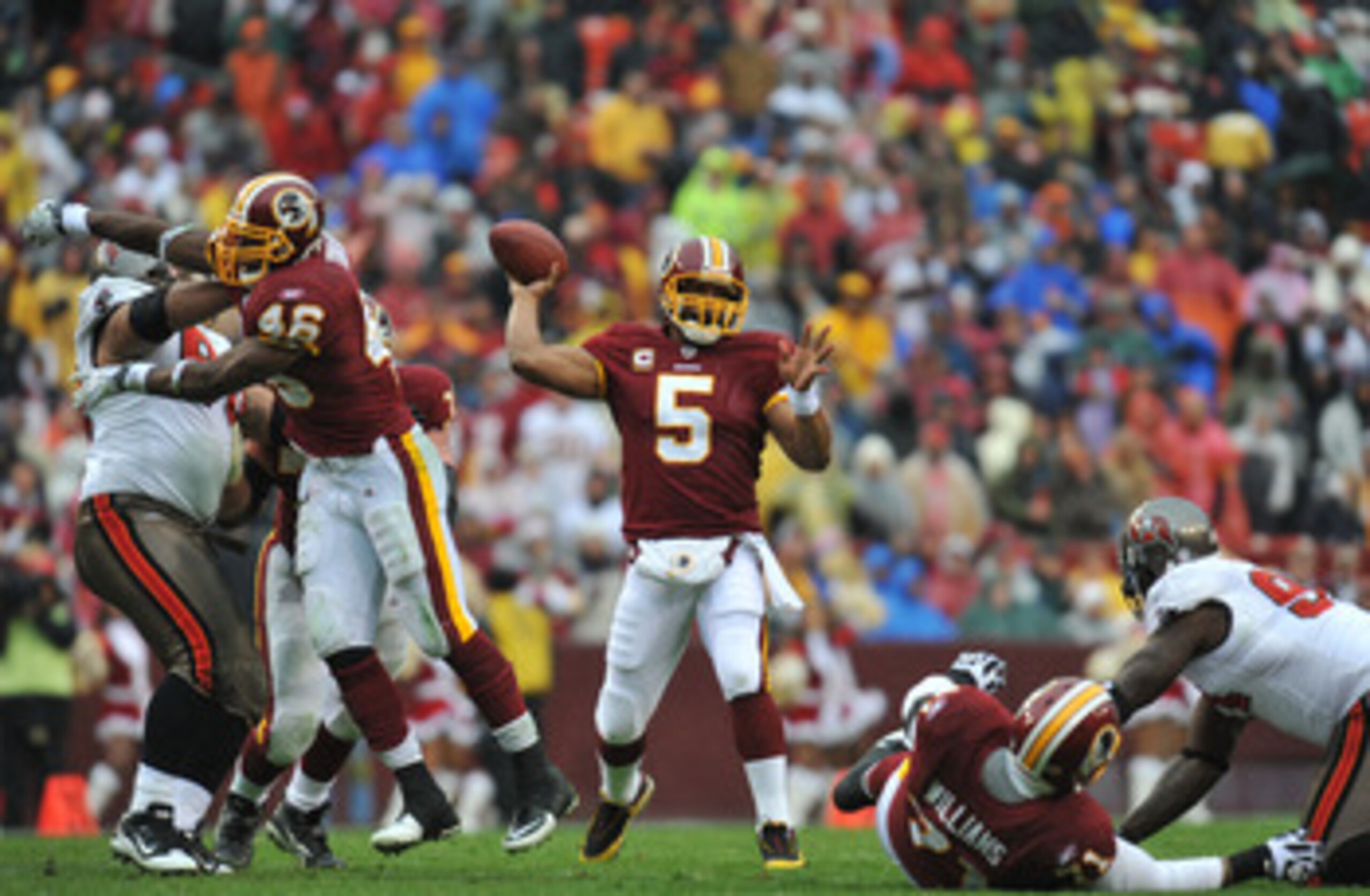 LANDOVER, MD - DECEMBER 12:  Donovan McNabb #5 of the Washington Redskins passes against the Tampa Bay Buccaneers  at FedExField on December 12, 2010 in Landover, Maryland. The Buccaneers defeated the Redskins 17-16. (Photo by Larry French/Getty Images)