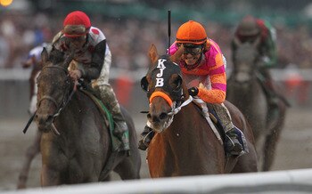 ELMONT, NY - JUNE 11:  Jose Valdivia, Jr. rides Ruler On Ice #3 to victory during the running of the 143rd Belmont Stakes at Belmont Park on June 11, 2011 in Elmont, New York.  (Photo by Nick Laham/Getty Images)