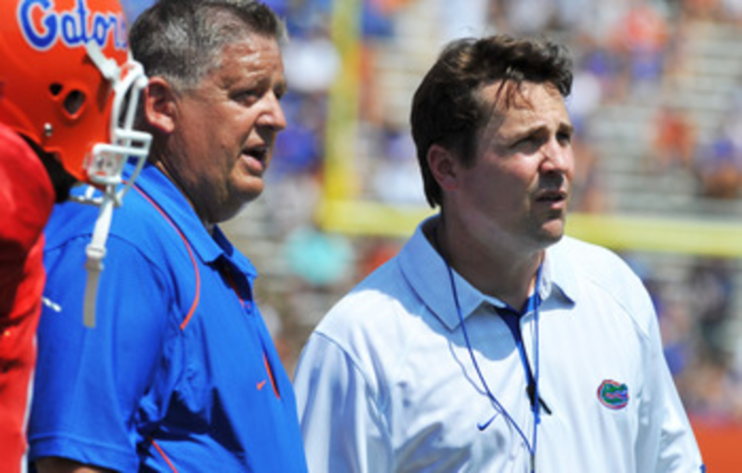 GAINESVILLE, FL - APRIL 9:  Coach Will Muschamp and offensive coordinator Charlie Weis of the Florida Gators direct play during the Orange and Blue spring football game April 9, 2010 Ben Hill Griffin Stadium in Gainesville, Florida.  (Photo by Al Messersc