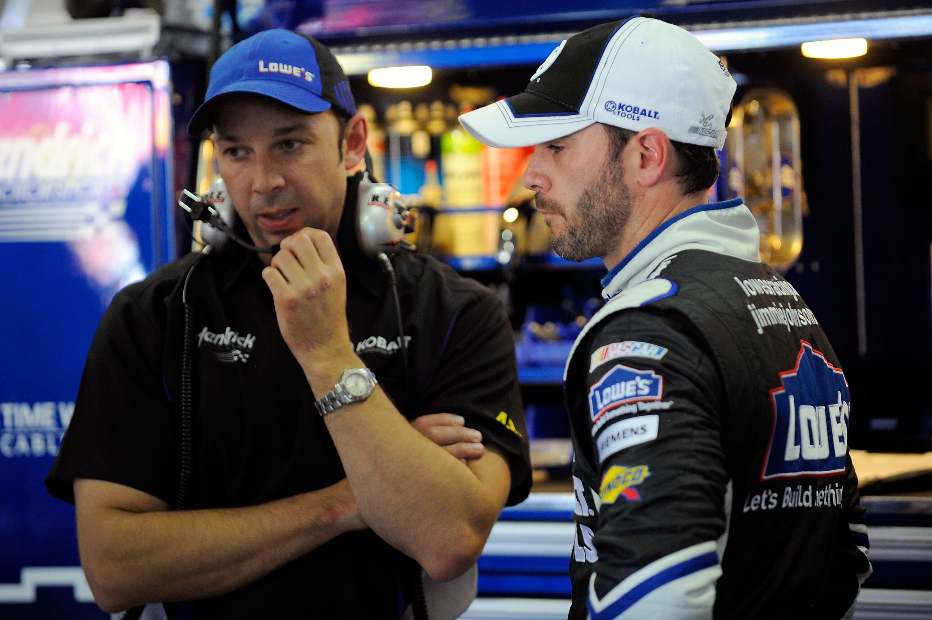 FORT WORTH, TX - APRIL 07: Jimmie Johnson (R), driver of the #48 Lowe's/Kobalt Tools Chevrolet, speaks with crew chief Chad Knaus (L), during practice for the NASCAR Sprint Cup Series Samsung Mobile 500 at Texas Motor Speedway on April 7, 2011 in Fort Wor