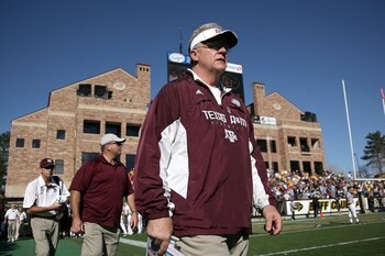 BOULDER, CO - NOVEMBER 07: Head coach Mike Sherman of the Texas A&M Aggies enters the field for the second half as he leads his team against the Colorado Buffaloes during NCAA college football action at Folsom Field on November 7, 2009 in Boulder, Colora BOULDER, CO - NOVEMBER 07: Head coach Mike Sherman of the Texas A&M Aggies enters the field for the second half as he leads his team against the Colorado Buffaloes during NCAA college football action at Folsom Field on November 7, 2009 in Boulder, Colora