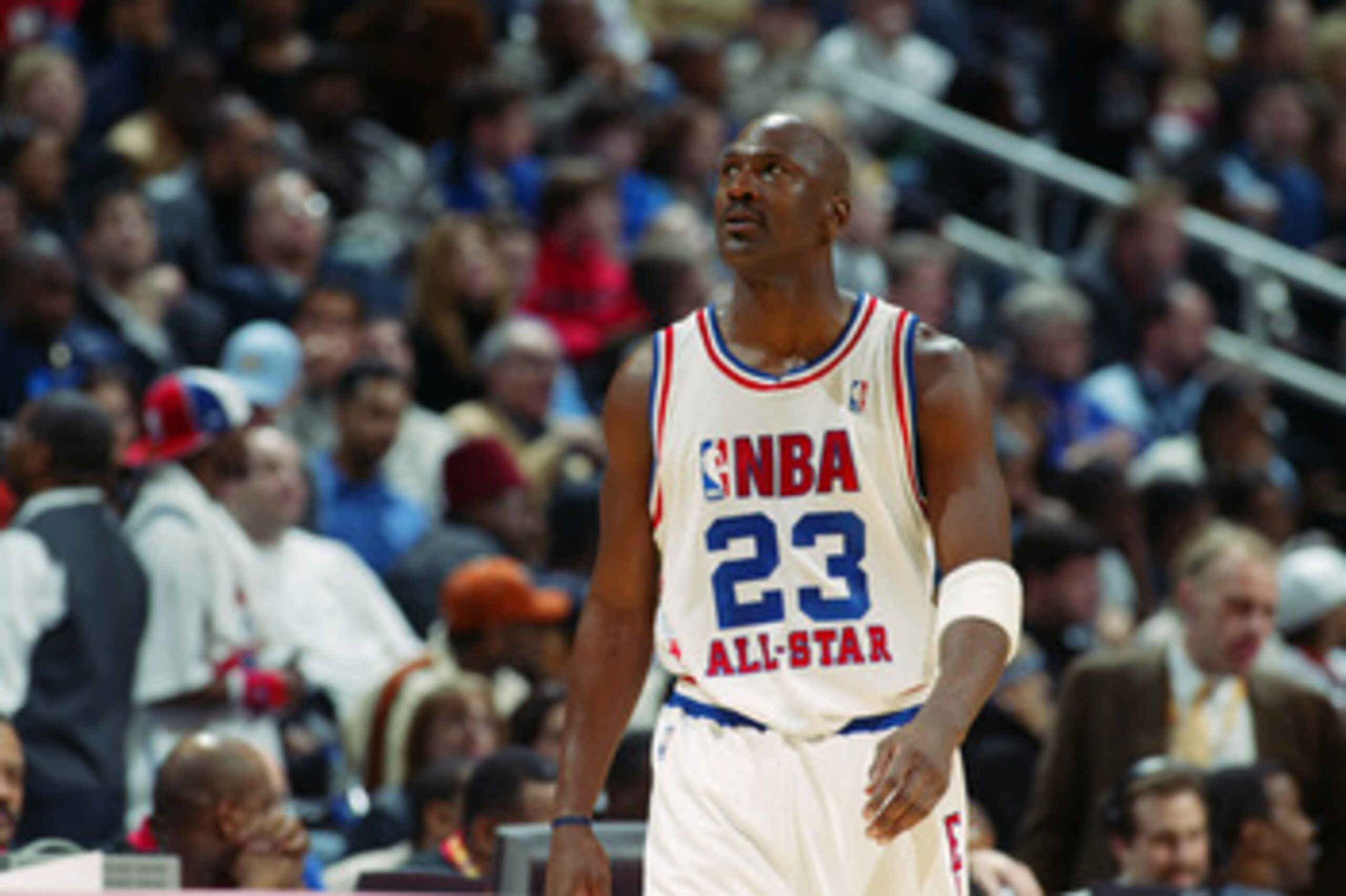 ATLANTA - FEBRUARY 9:  Michael Jordan (Washington Wizards) #23 of the Eastern Conference All-Stars looks on at the 2003 NBA All-Star Game on February 9, 2003 at Philips Arena in Atlanta, Georgia.  NOTE TO USER:  User expressly acknowledges and agrees that