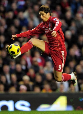 LIVERPOOL, ENGLAND - NOVEMBER 07:   Fernando Torres of Liverpool wins the ball during the Barclays Premier League match between Liverpool and Chelsea at Anfield on November 7, 2010 in Liverpool, England. (Photo by Shaun Botterill/Getty Images)