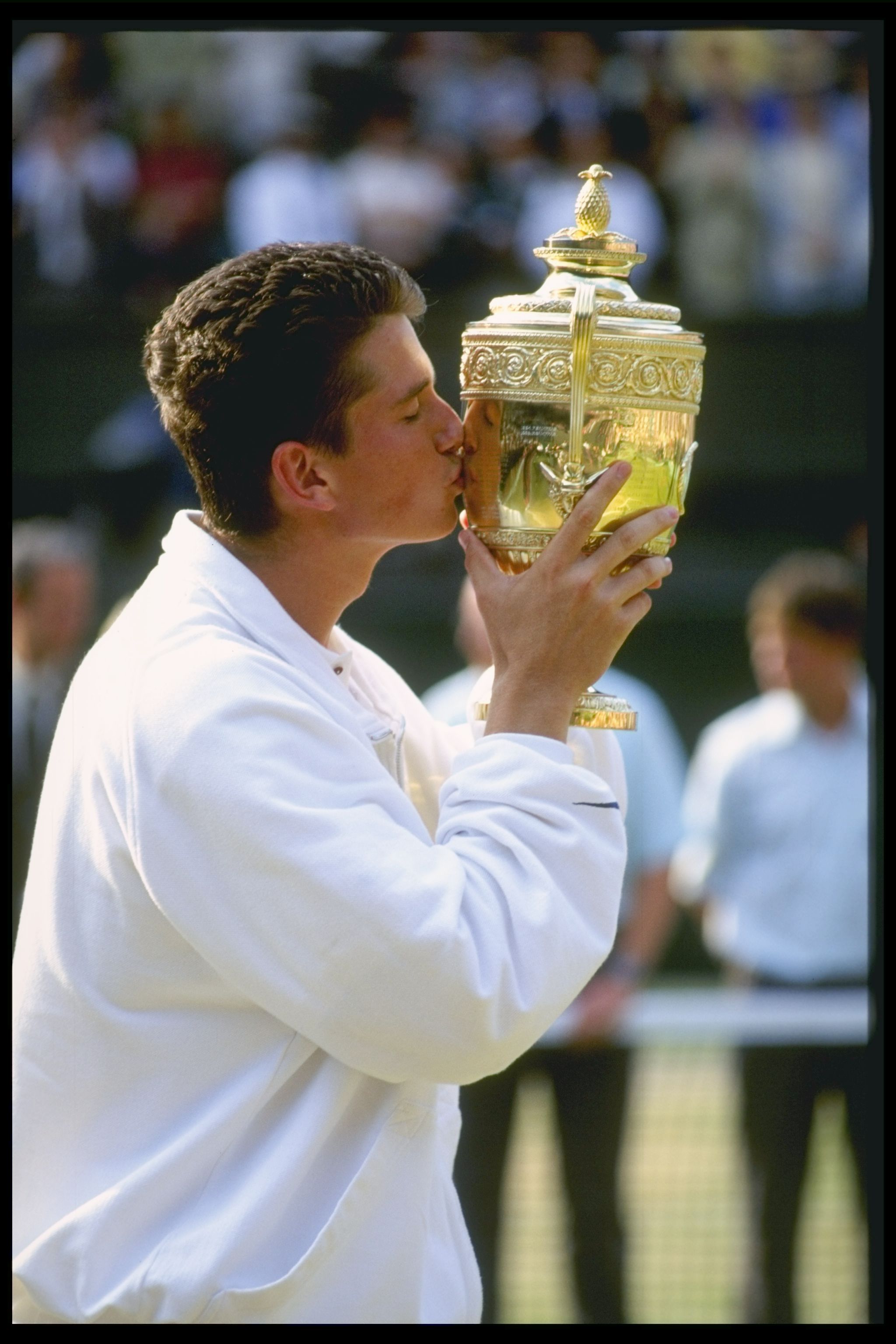 7 Jul 1996:  Richard Krajicek of the Netherlands kisses the mens singles trophy after his victory over Malivai Washington of the USA in straight sets during the Wimbledon tennis championships at the all England club in London.Mandatory Credit: Clive Bruns