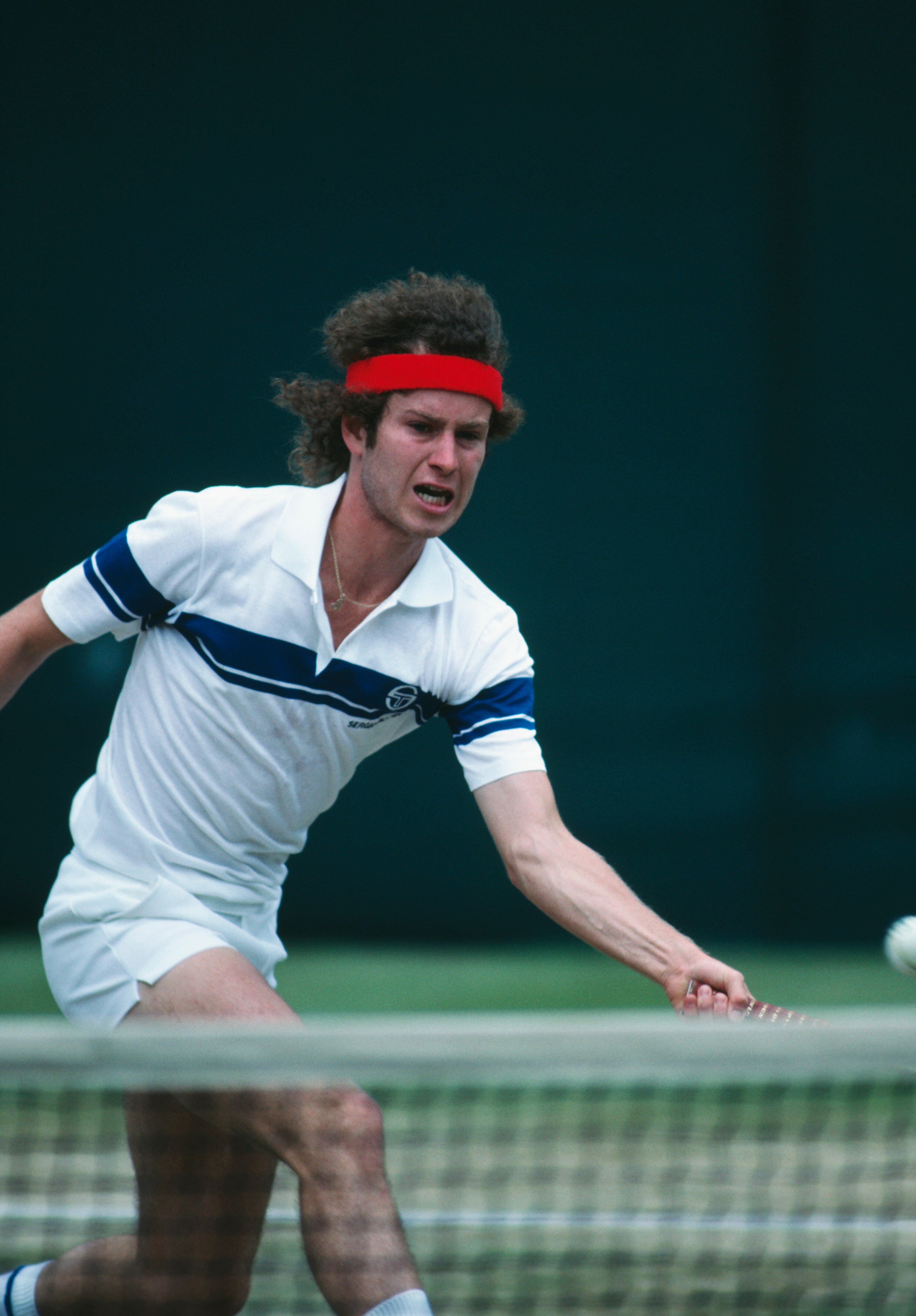 American tennis player John McEnroe competing at Wimbledon, 1981. McEnroe went on to win the men's singles title. (Photo by Steve Powell/Getty Images)