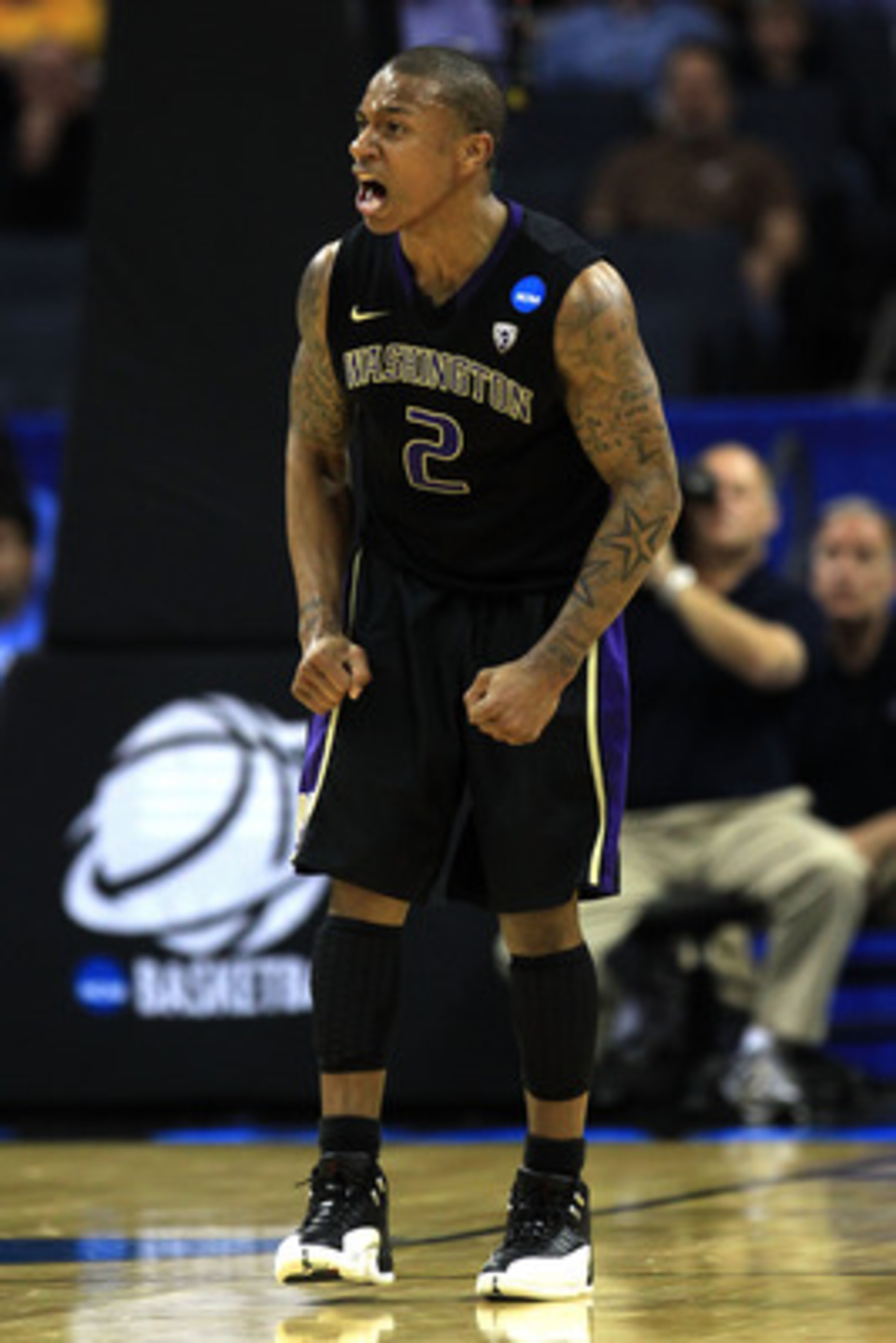 CHARLOTTE, NC - MARCH 20:  Isaiah Thomas #2 of the Washington Huskies reacts in the second half while taking on the North Carolina Tar Heels during the third round of the 2011 NCAA men's basketball tournament at Time Warner Cable Arena on March 20, 2011 i