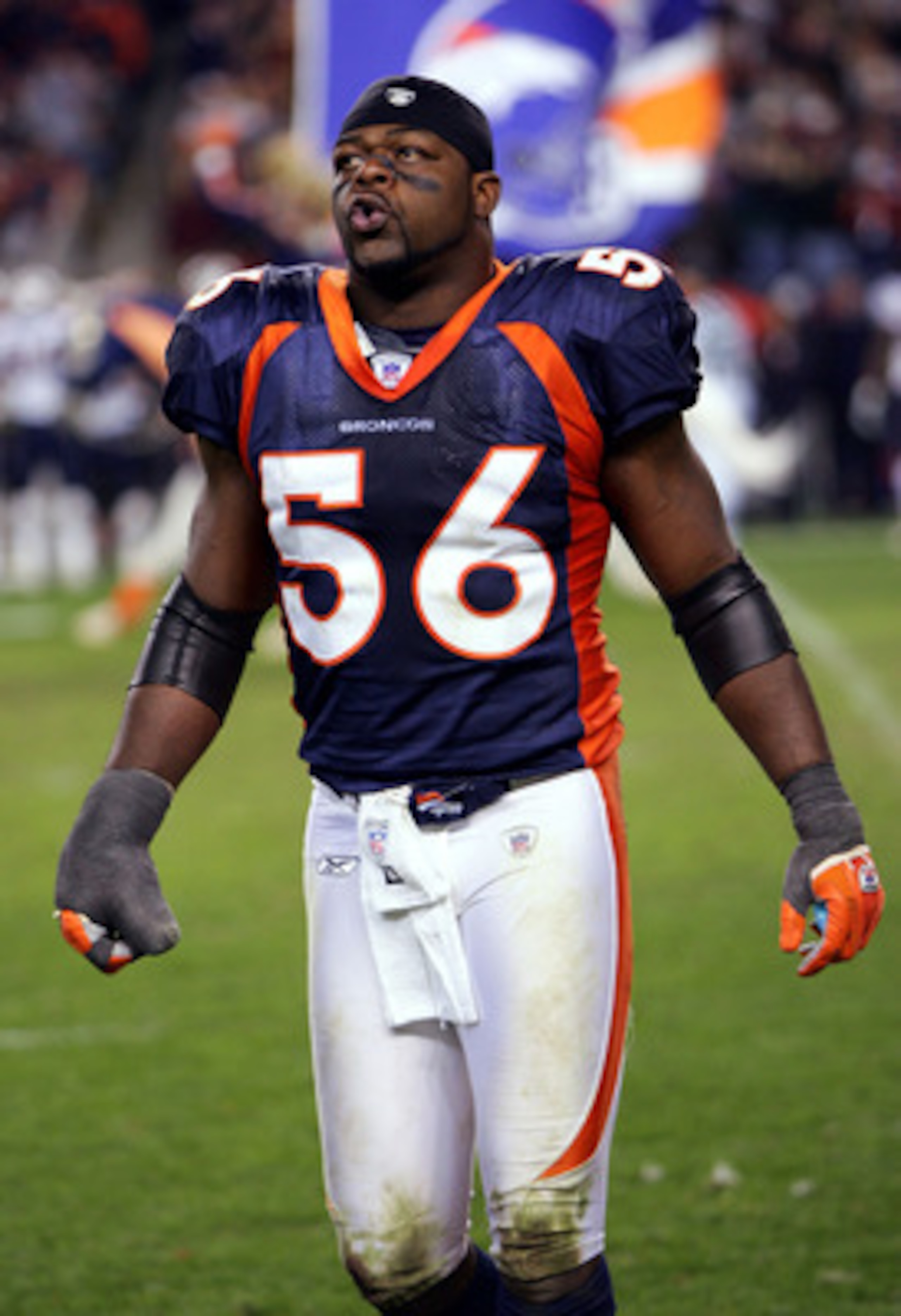 DENVER - JANUARY 14: Al Wilson #56 of the Denver Broncos stands on the field before a game against the New England Patriots during the AFC Divisional Playoff game on January 14, 2006 at Invesco Field at Mile High in Denver, Colorado. The Broncos won the DENVER - JANUARY 14: Al Wilson #56 of the Denver Broncos stands on the field before a game against the New England Patriots during the AFC Divisional Playoff game on January 14, 2006 at Invesco Field at Mile High in Denver, Colorado. The Broncos won the