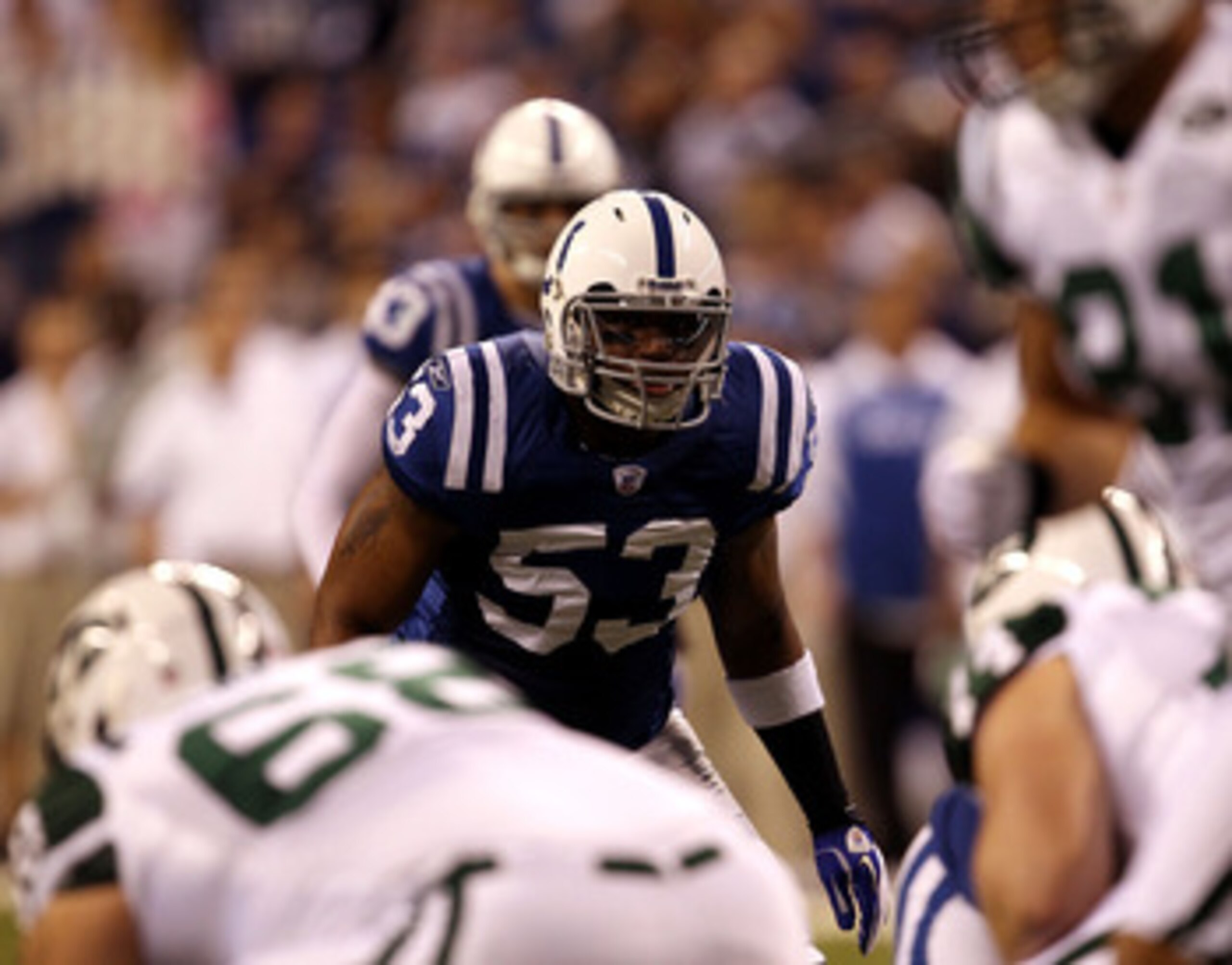 INDIANAPOLIS, IN - JANUARY 08:  Linebacker Kavell Conner #53 of the Indianapolis Colts lines up on defense against the New York Jets during their 2011 AFC wild card playoff game at Lucas Oil Stadium on January 8, 2011 in Indianapolis, Indiana. The Jets wo