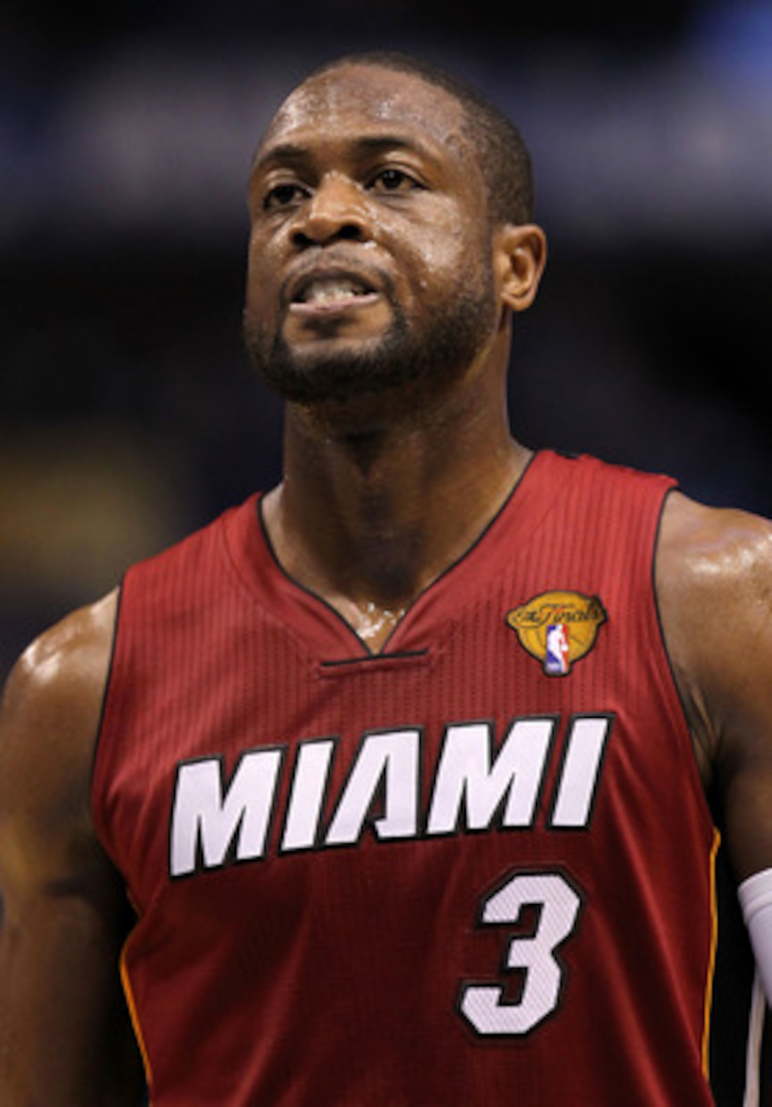 DALLAS, TX - JUNE 05:  Dwyane Wade #3 of the Miami Heat looks on as the Heat take on the Dallas Mavericks in Game Three of the 2011 NBA Finals at American Airlines Center on June 5, 2011 in Dallas, Texas.  NOTE TO USER: User expressly acknowledges and agr