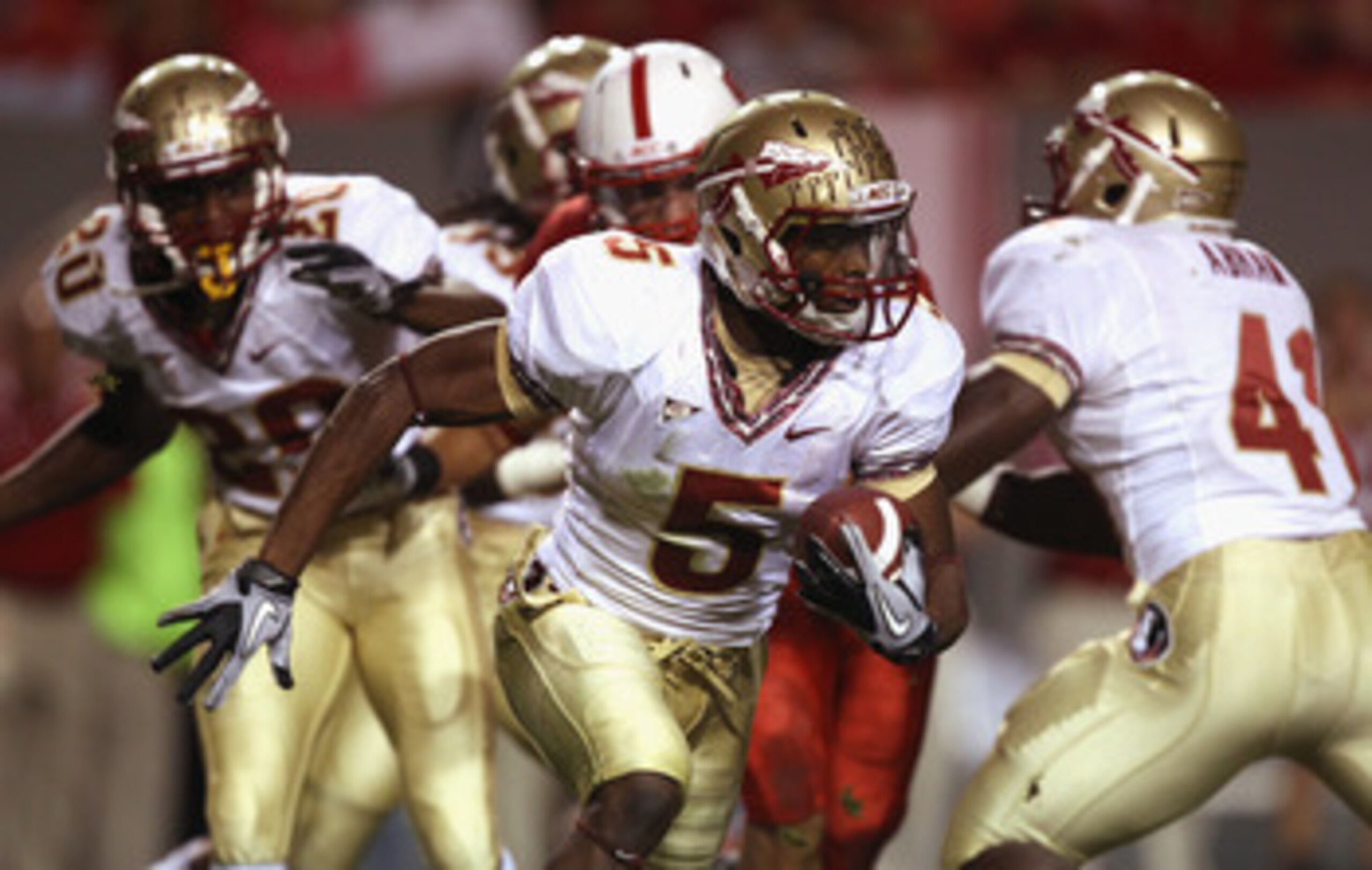 RALEIGH, NC - OCTOBER 28:  Greg Reid #5 of the Florida State Seminoles runs with the ball against the North Carolina State Wolfpack during their game at Carter-Finley Stadium on October 28, 2010 in Raleigh, North Carolina.  (Photo by Streeter Lecka/Getty