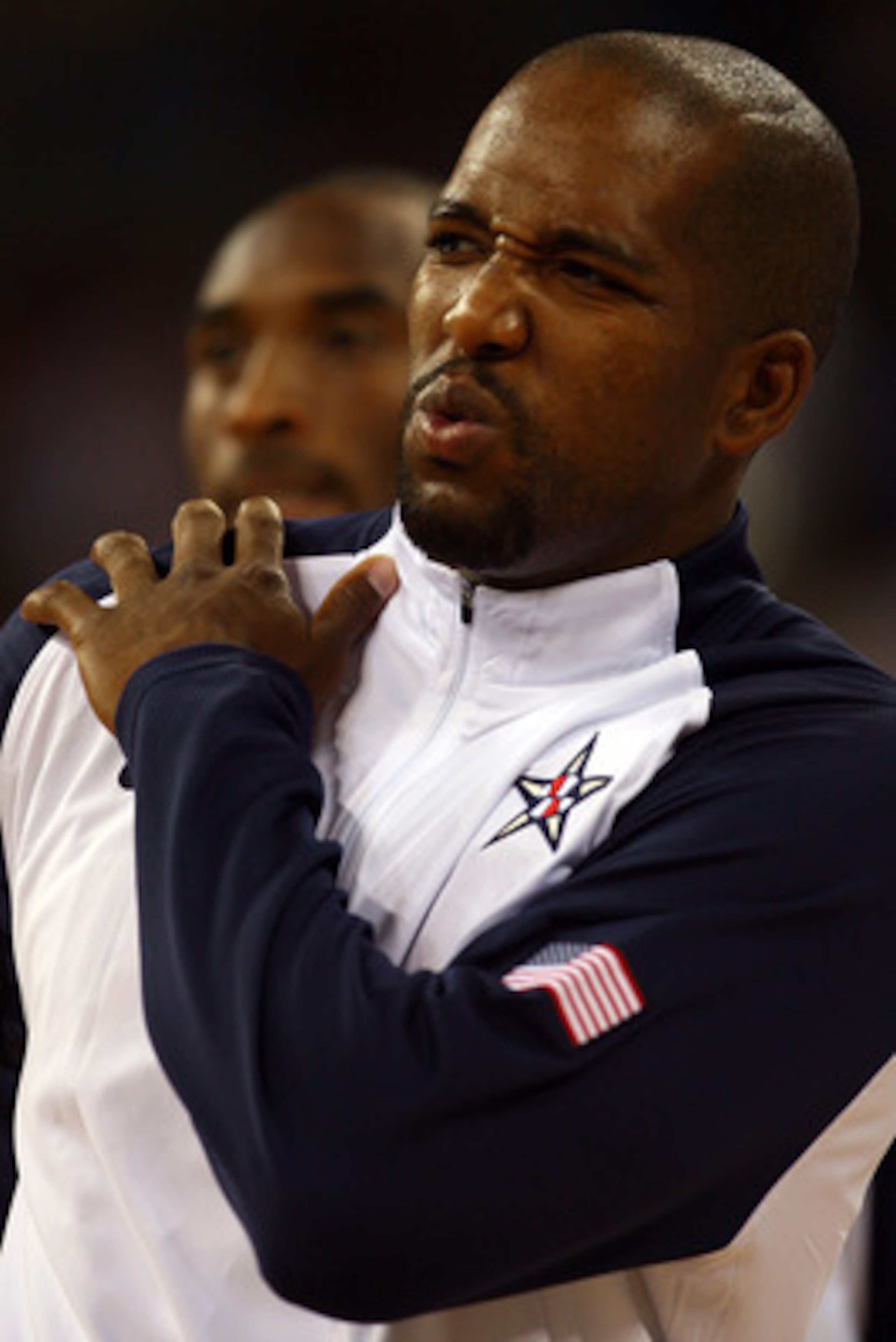 BEIJING - AUGUST 12:  Michael Redd #8 of the United States winces before taking on Angola during the men's preliminary round basketball game at the Beijing Olympic Basketball Gymnasium during Day 4 of the Beijing 2008 Olympic Games on August 12, 2008 in B