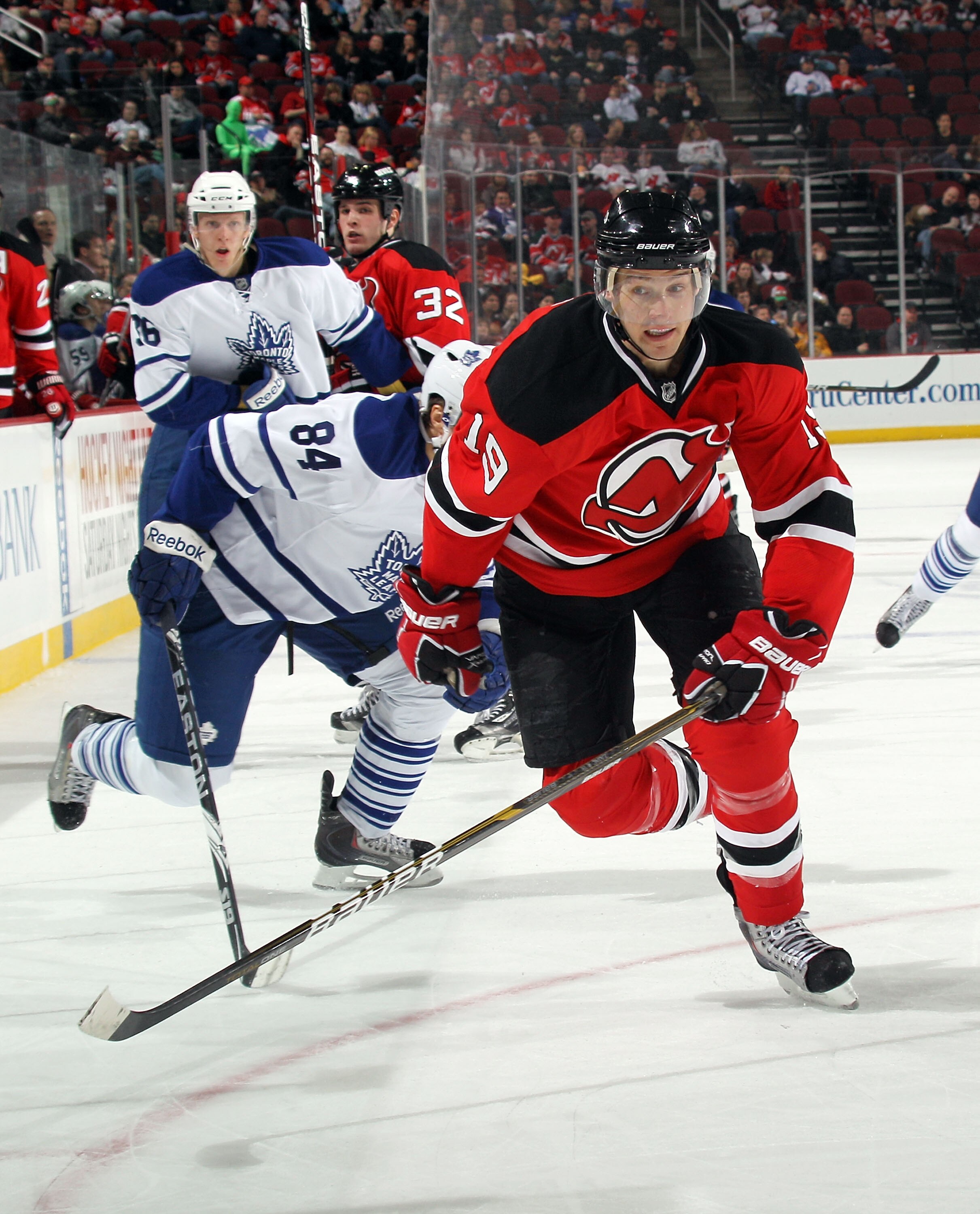NEWARK, NJ - APRIL 06: Travis Zajac #19 of the New Jersey Devils skates against the Toronto Maple Leafs at the Prudential Center on April 6, 2011 in Newark, New Jersey.  (Photo by Bruce Bennett/Getty Images)