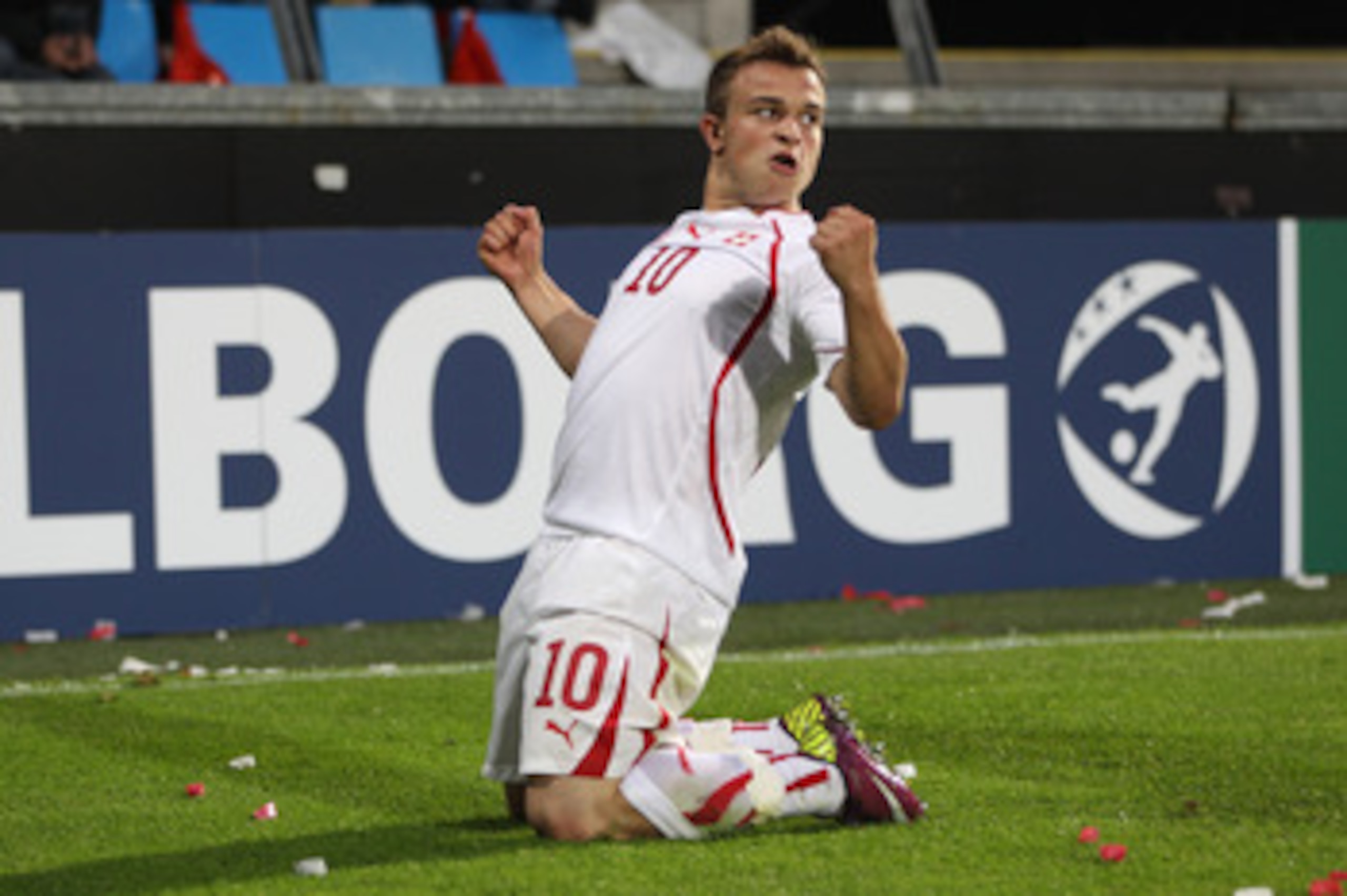 AALBORG, DENMARK - JUNE 11: Xherdan Shaqiri of Switzerland celebrates scoring the winning goal during the UEFA European Under-21 Championship Group A match between Denmark and Switzerland at the Aalborg Stadium on June 11, 2011 in Aalborg, Denmark. (Ph AALBORG, DENMARK - JUNE 11: Xherdan Shaqiri of Switzerland celebrates scoring the winning goal during the UEFA European Under-21 Championship Group A match between Denmark and Switzerland at the Aalborg Stadium on June 11, 2011 in Aalborg, Denmark. (Ph