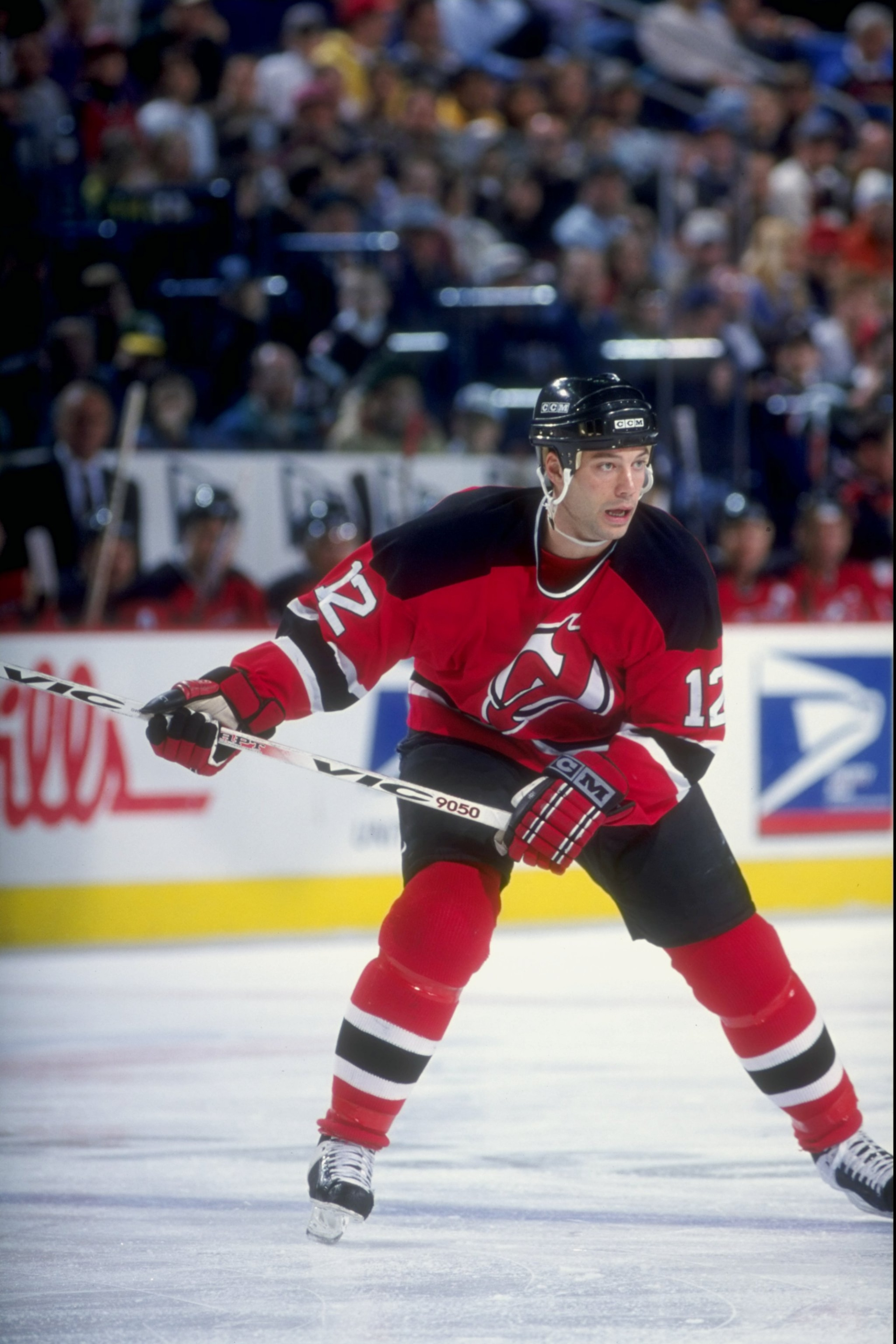 29 Dec 1997:  Bill Guerin #12 of the New Jersey Devils looks on during a game against the Buffalo Sabres at the Marine Midland Arena in Buffalo, New York. The Devils defeated the Sabres 3-1. Mandatory Credit: Rick Stewart  /Allsport