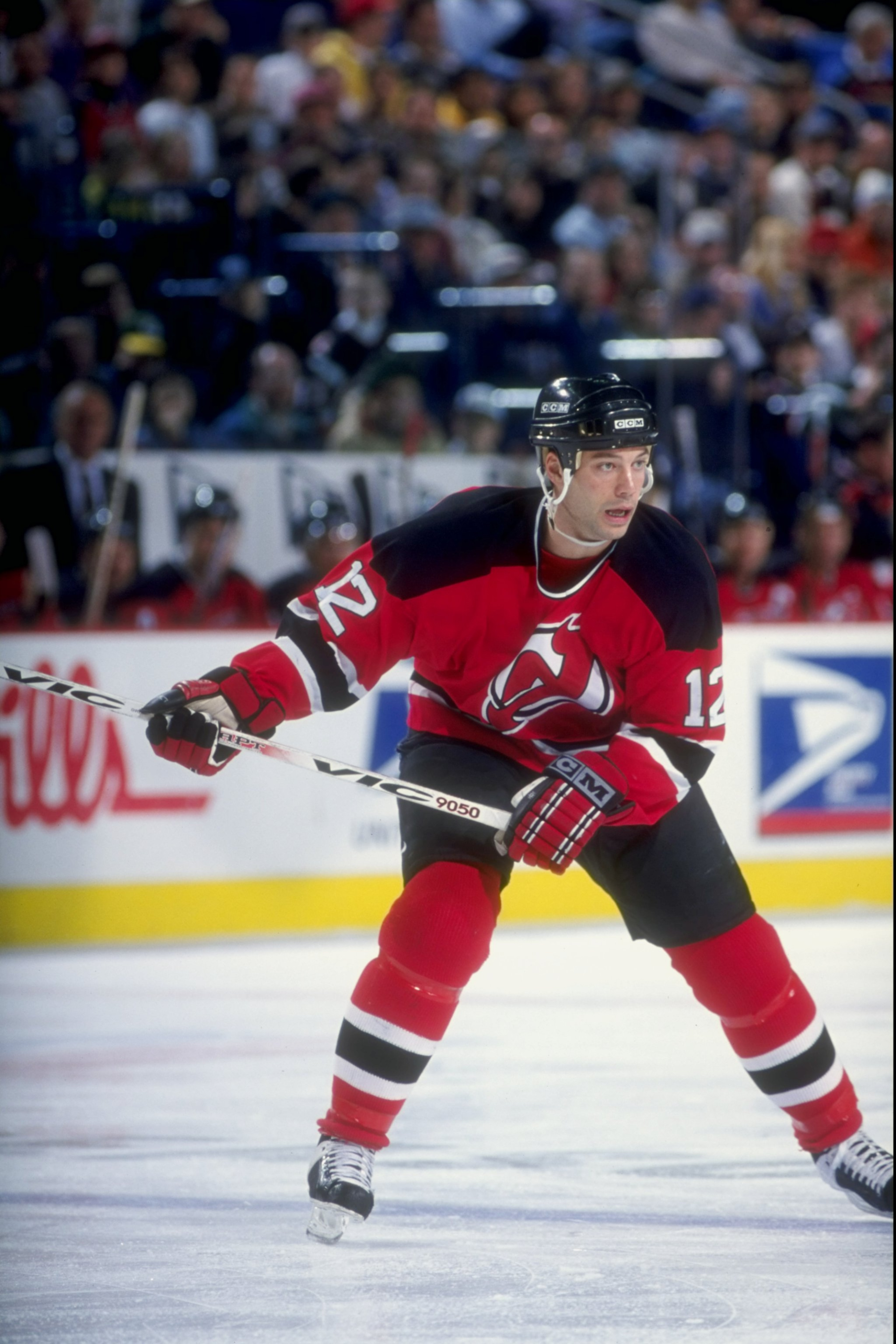29 Dec 1997:  Bill Guerin #12 of the New Jersey Devils looks on during a game against the Buffalo Sabres at the Marine Midland Arena in Buffalo, New York. The Devils defeated the Sabres 3-1. Mandatory Credit: Rick Stewart  /Allsport