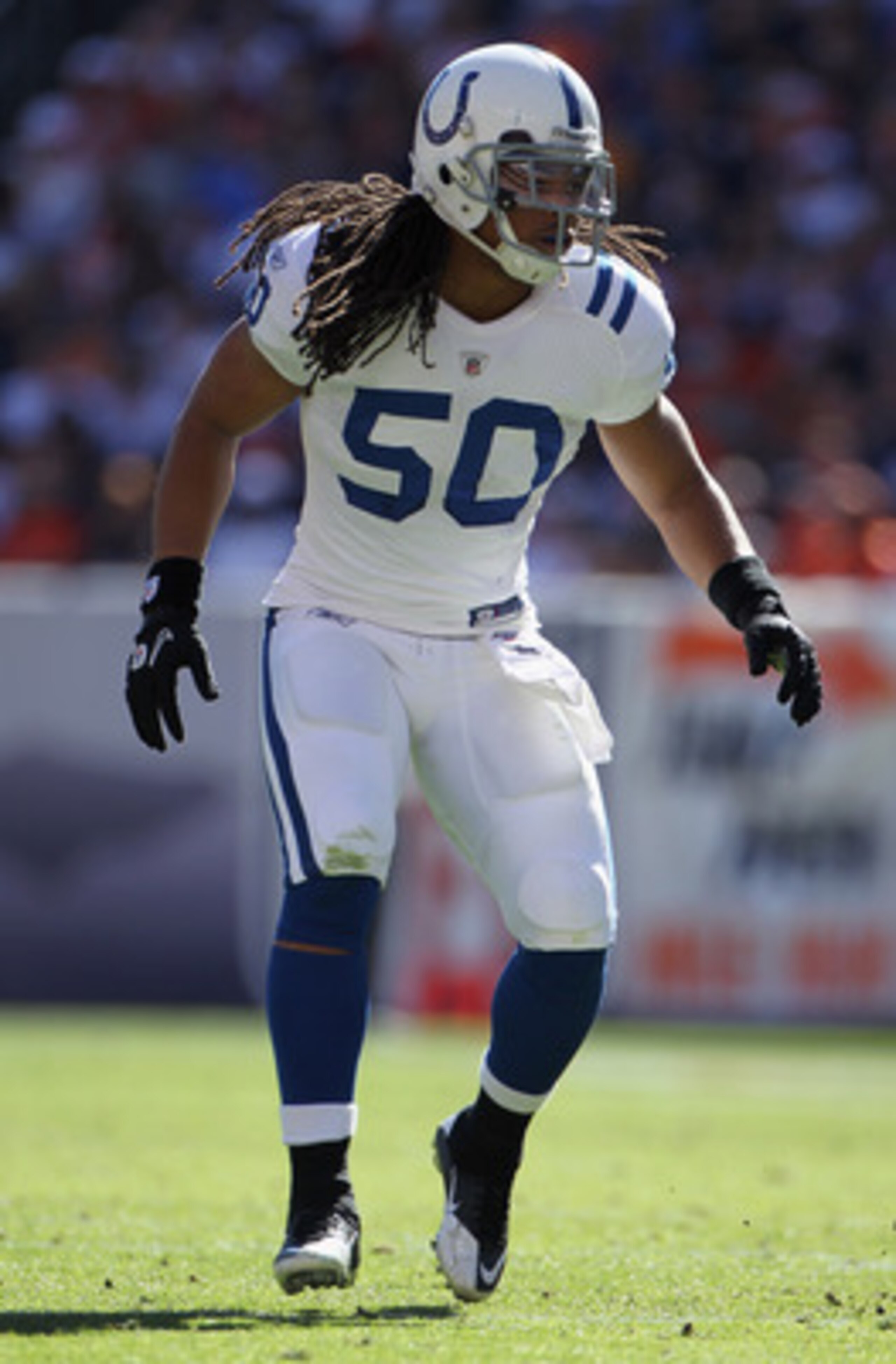 DENVER - SEPTEMBER 26:  Linebacker Philip Wheeler #50 of the Indianapolis Colts defends against the Denver Broncos at INVESCO Field at Mile High on September 26, 2010 in Denver, Colorado. The Colts defeated the Broncos 27-13.  (Photo by Doug Pensinger/Get