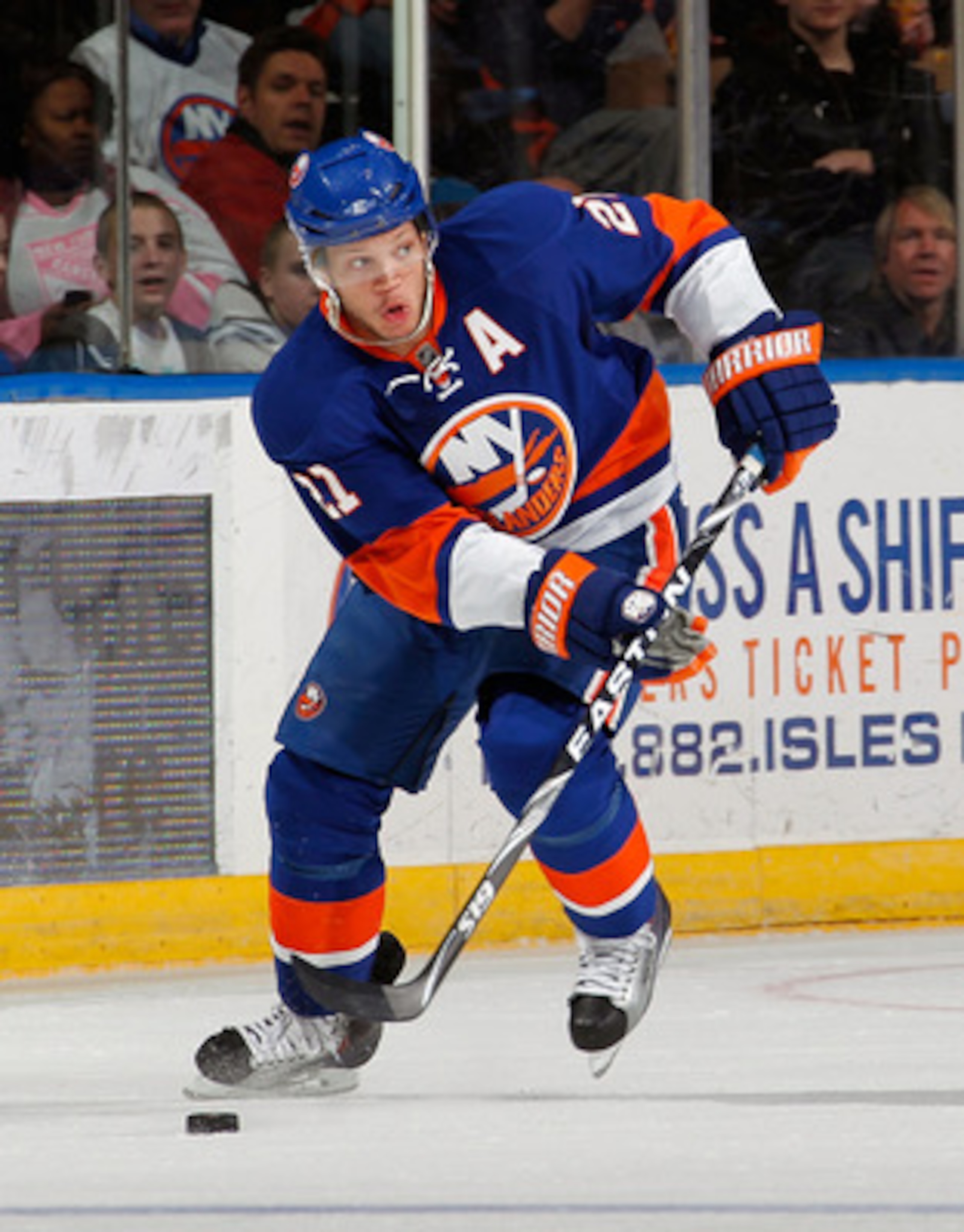 UNIONDALE, NY - MARCH 24: Kyle Okposo #21 of the New York Islanders skates during an NHL hockey game against the Atlanta Thrashers at the Nassau Coliseum on March 24, 2011 in Uniondale, New York. (Photo by Paul Bereswill/Getty Images) UNIONDALE, NY - MARCH 24: Kyle Okposo #21 of the New York Islanders skates during an NHL hockey game against the Atlanta Thrashers at the Nassau Coliseum on March 24, 2011 in Uniondale, New York. (Photo by Paul Bereswill/Getty Images)