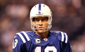 INDIANAPOLIS, IN - JANUARY 08:  Quarterback Peyton Manning #18 of the Indianapolis Colts looks on during warm ups against the New York Jets during their 2011 AFC wild card playoff game at Lucas Oil Stadium on January 8, 2011 in Indianapolis, Indiana.  (Ph