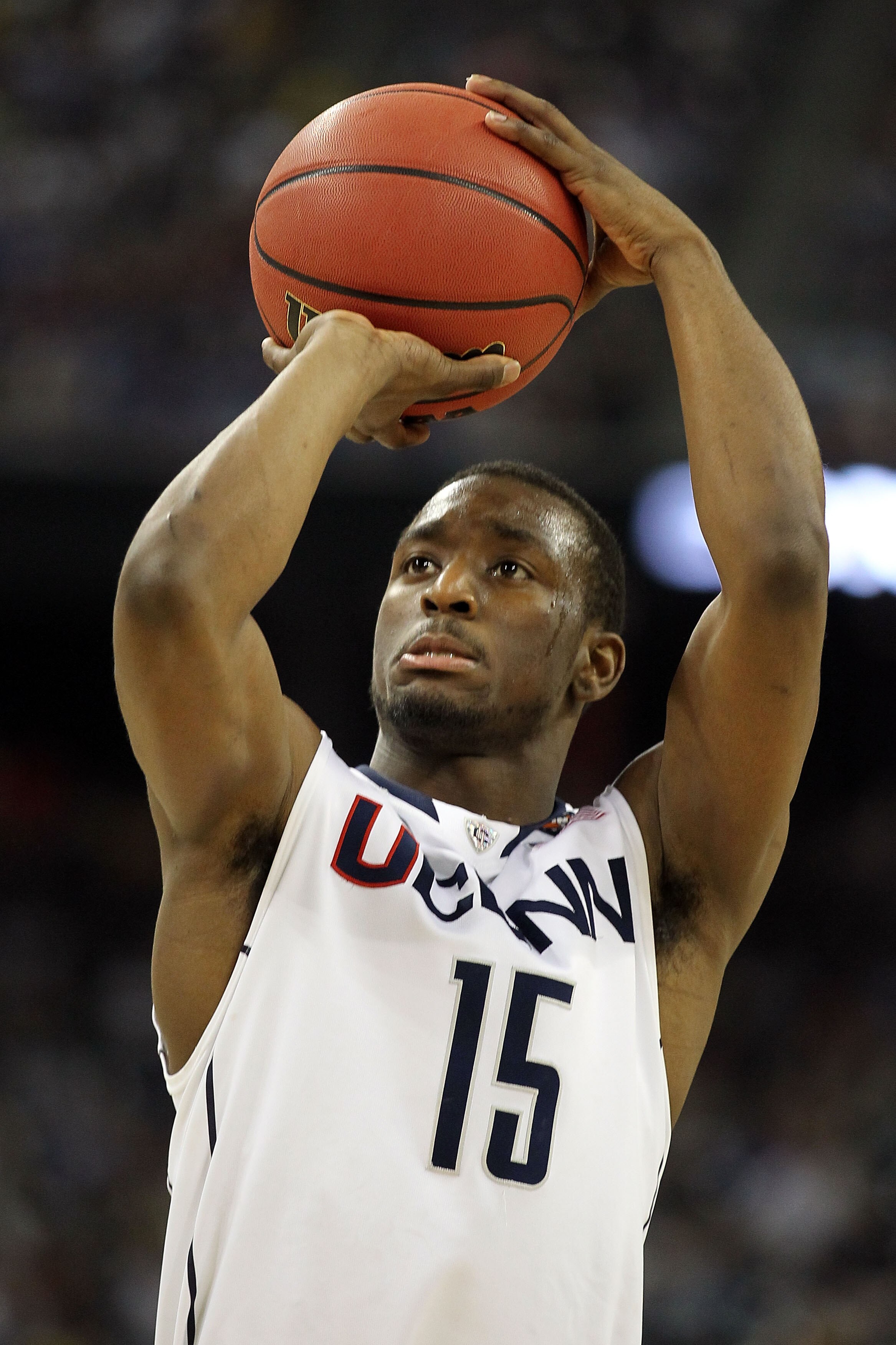 HOUSTON, TX - APRIL 02:  Kemba Walker #15 of the Connecticut Huskies shoots a free throw while taking on the Kentucky Wildcats during the National Semifinal game of the 2011 NCAA Division I Men's Basketball Championship at Reliant Stadium on April 2, 2011