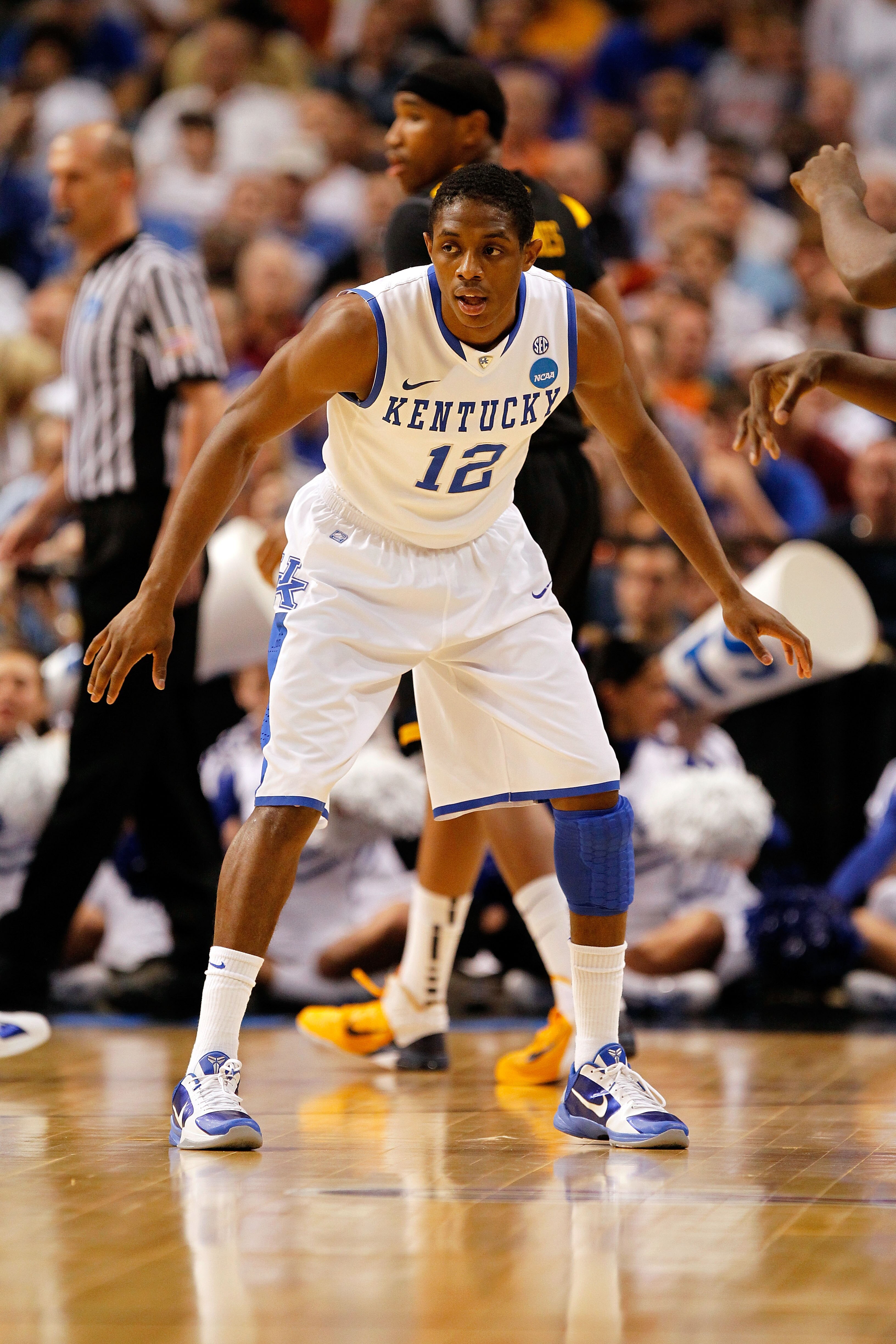 TAMPA, FL - MARCH 19:  Brandon Knight #12 of the Kentucky Wildcats defends against the West Virginia Mountaineers during the third round of the 2011 NCAA men's basketball tournament at St. Pete Times Forum on March 19, 2011 in Tampa, Florida. Kentucky won