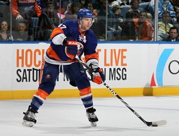 UNIONDALE, NY - FEBRUARY 11:  Andrew MacDonald #47 of the New York Islanders skates against the Pittsburgh Penguins on February 11, 2011 at Nassau Coliseum in Uniondale, New York. The Isles defeated the Pens 9-3.  (Photo by Jim McIsaac/Getty Images)