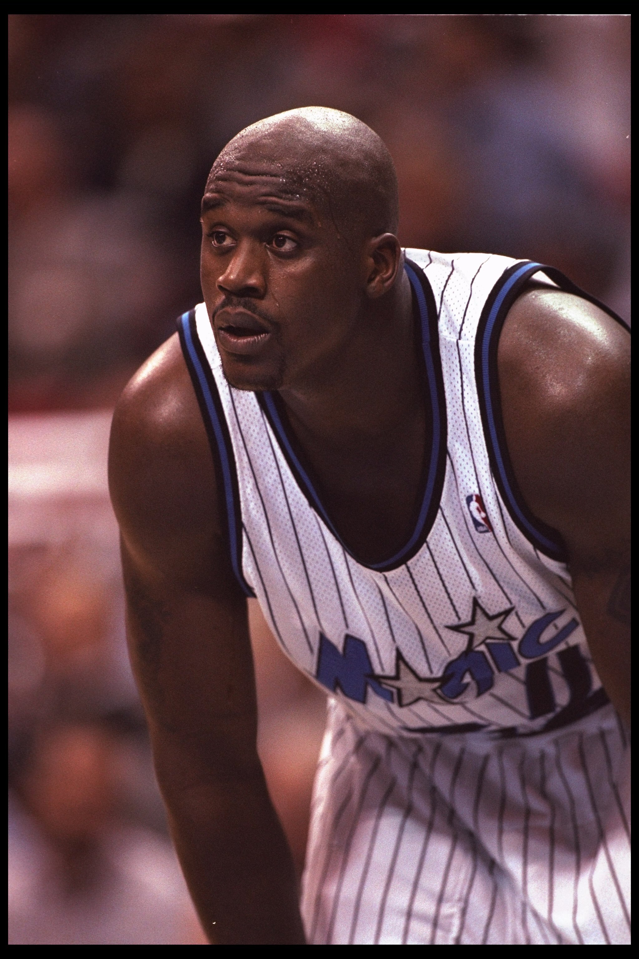 13 Feb 1996: Center Shaquille O'Neal of the Orlando Magic looks on during a game against the Denver Nuggets played at the Orlando Arena in Orlando, Florida. The Magic won the game, 121-93.