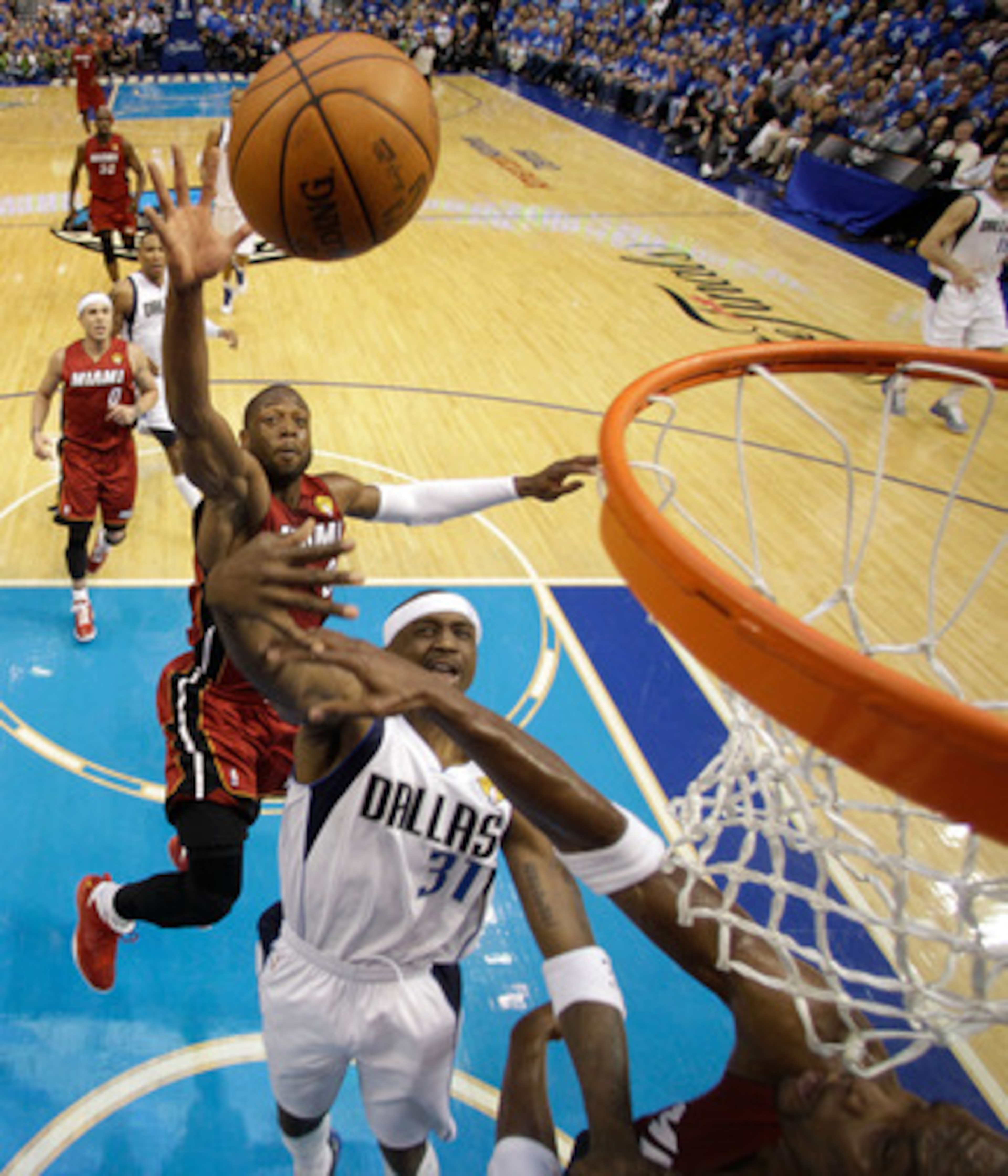 DALLAS, TX - JUNE 05:  Dwyane Wade #3 of the Miami Heat blocks a shot attempt by Jason Terry #31 of the Dallas Mavericks in Game Three of the 2011 NBA Finals at American Airlines Center on June 5, 2011 in Dallas, Texas.  NOTE TO USER: User expressly ackno