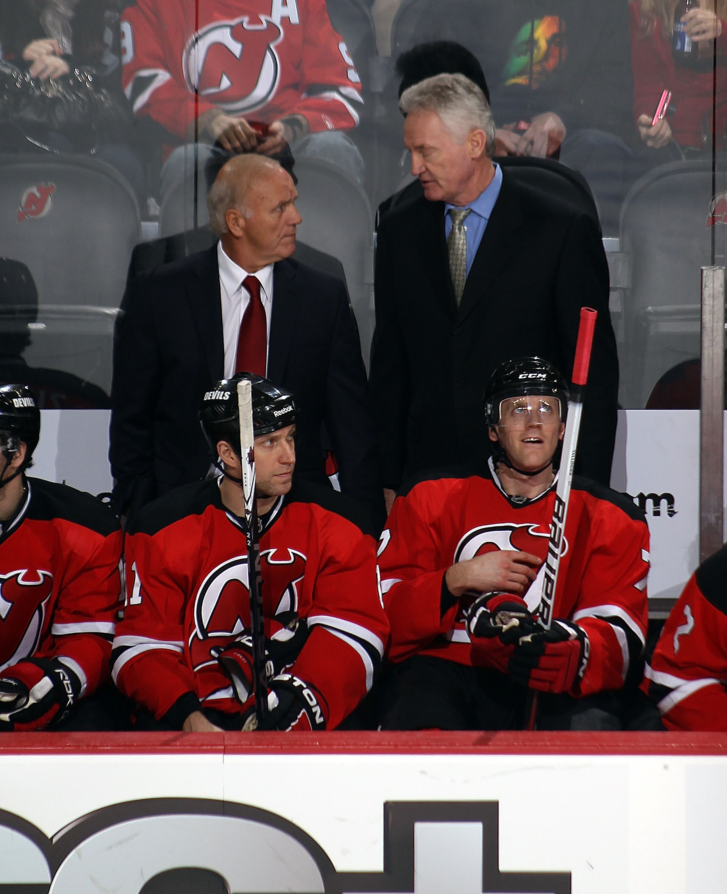 NEWARK, NJ - JANUARY 06:  Head coach Jacques Lemaire and assistant coach Larry Robinson of the New Jersey Devils confer during the game against the Philadelphia Flyers at the Prudential Center on January 6, 2011 in Newark, New Jersey. The Flyers defeated