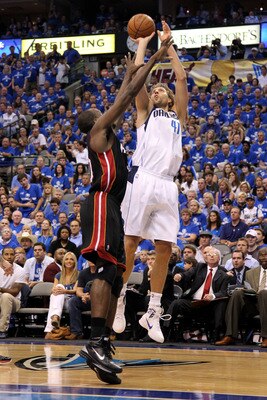 DALLAS, TX - JUNE 09:  Dirk Nowitzki #41 of the Dallas Mavericks attempts a shot against Joel Anthony #50 of the Miami Heat in Game Five of the 2011 NBA Finals at American Airlines Center on June 9, 2011 in Dallas, Texas.  NOTE TO USER: User expressly ack