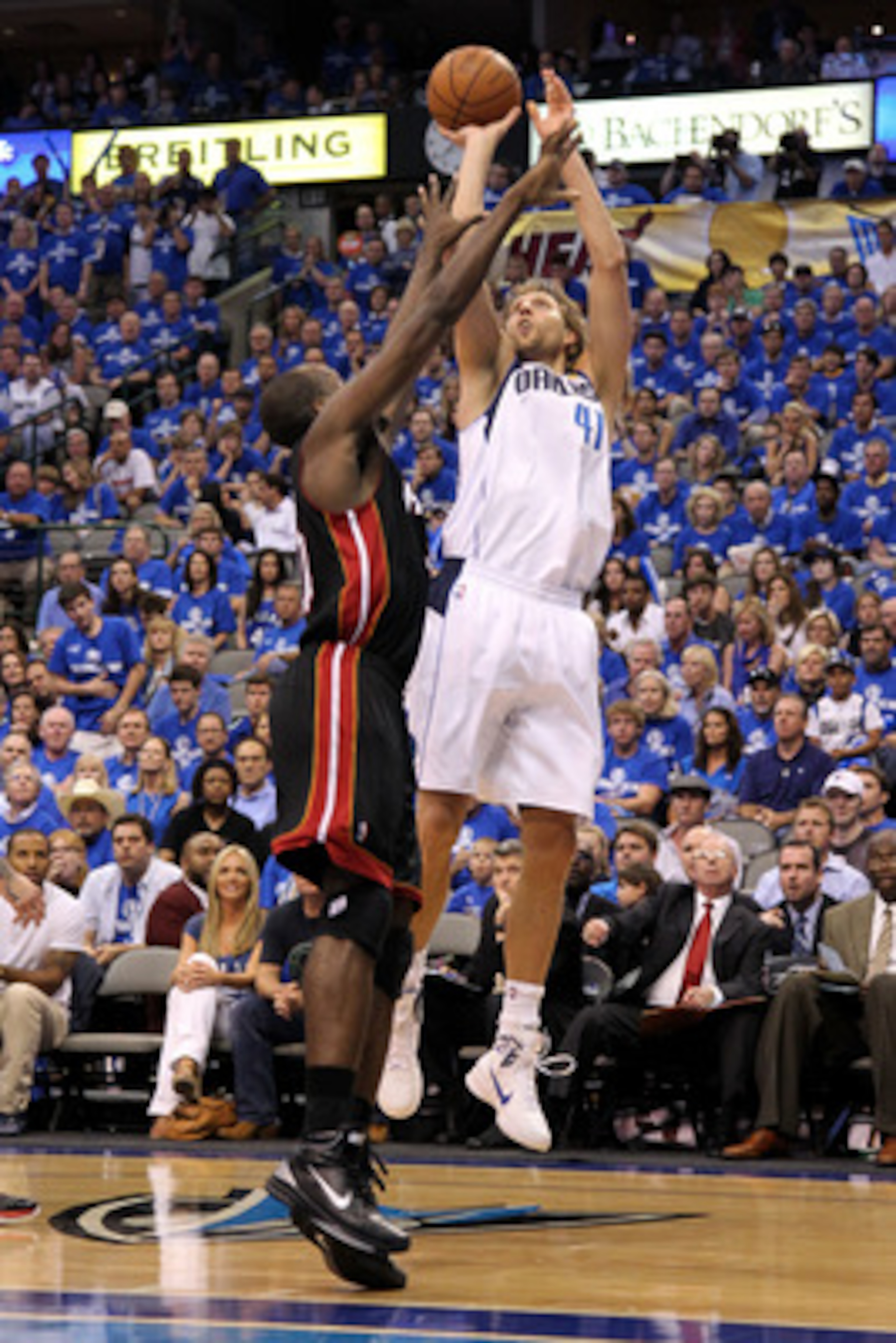 DALLAS, TX - JUNE 09:  Dirk Nowitzki #41 of the Dallas Mavericks attempts a shot against Joel Anthony #50 of the Miami Heat in Game Five of the 2011 NBA Finals at American Airlines Center on June 9, 2011 in Dallas, Texas.  NOTE TO USER: User expressly ack