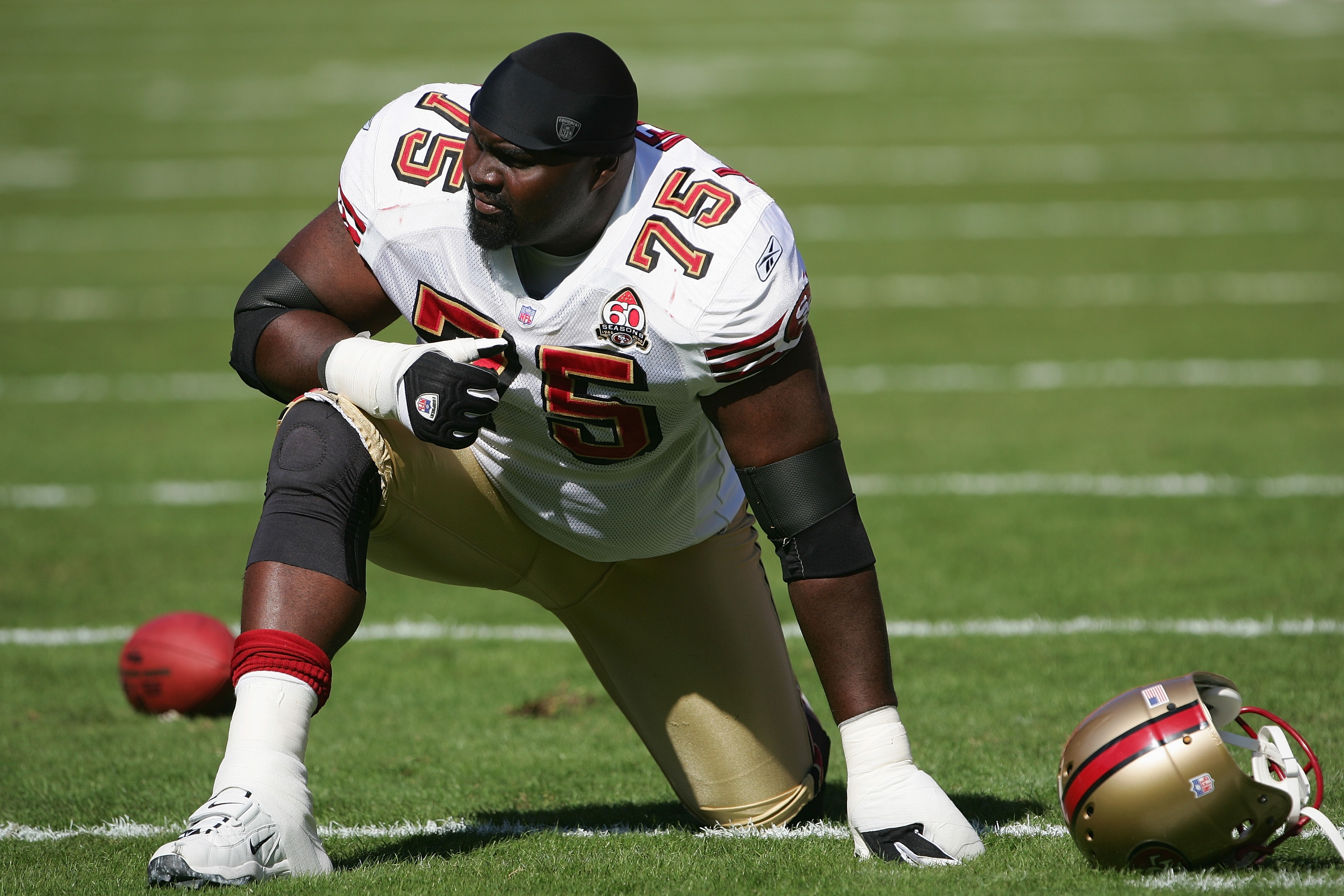KANSAS CITY, MO - OCTOBER 1:  Offensive tackle Jonas Jennings #75 of the San Francisco 49ers stretches before the game against the Kansas City Chiefs at Arrowhead Stadium on October 1, 2006 in Kansas City, Missouri. The Chiefs defeated the Niners 41-0.  (