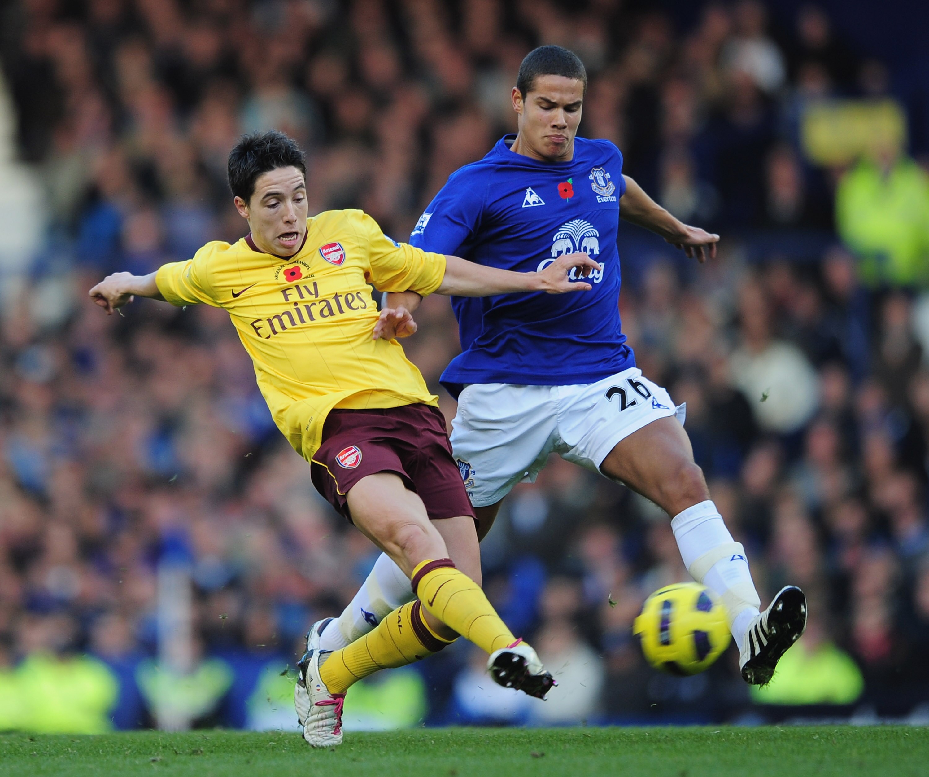 LIVERPOOL, ENGLAND - NOVEMBER 14:  Samir Nasri of Arsenal is challenged by Jack Rodwell of Everton during the Barclays Premier League match between Everton and Arsenal at Goodison Park on November 14, 2010 in Liverpool, England.  (Photo by Shaun Botterill