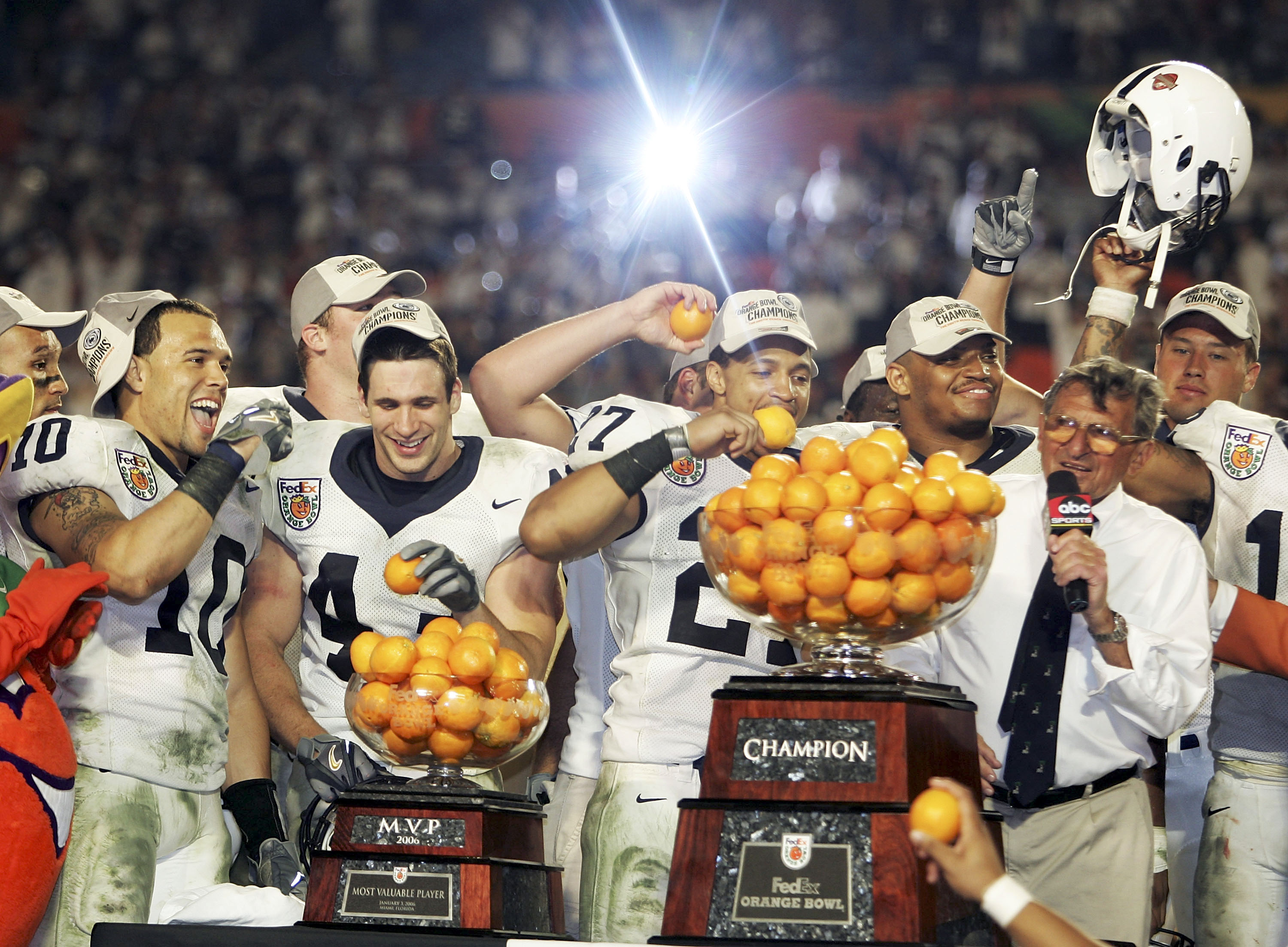 MIAMI - JANUARY 4:  Head coach Joe Paterno of the Penn State Nittany Lions celebrates with his team after defeating the Florida State Seminoles in the FedEx Orange Bowl on January 4, 2006 at Dolphins Stadium in Miami, Florida. Penn State defeated Florida