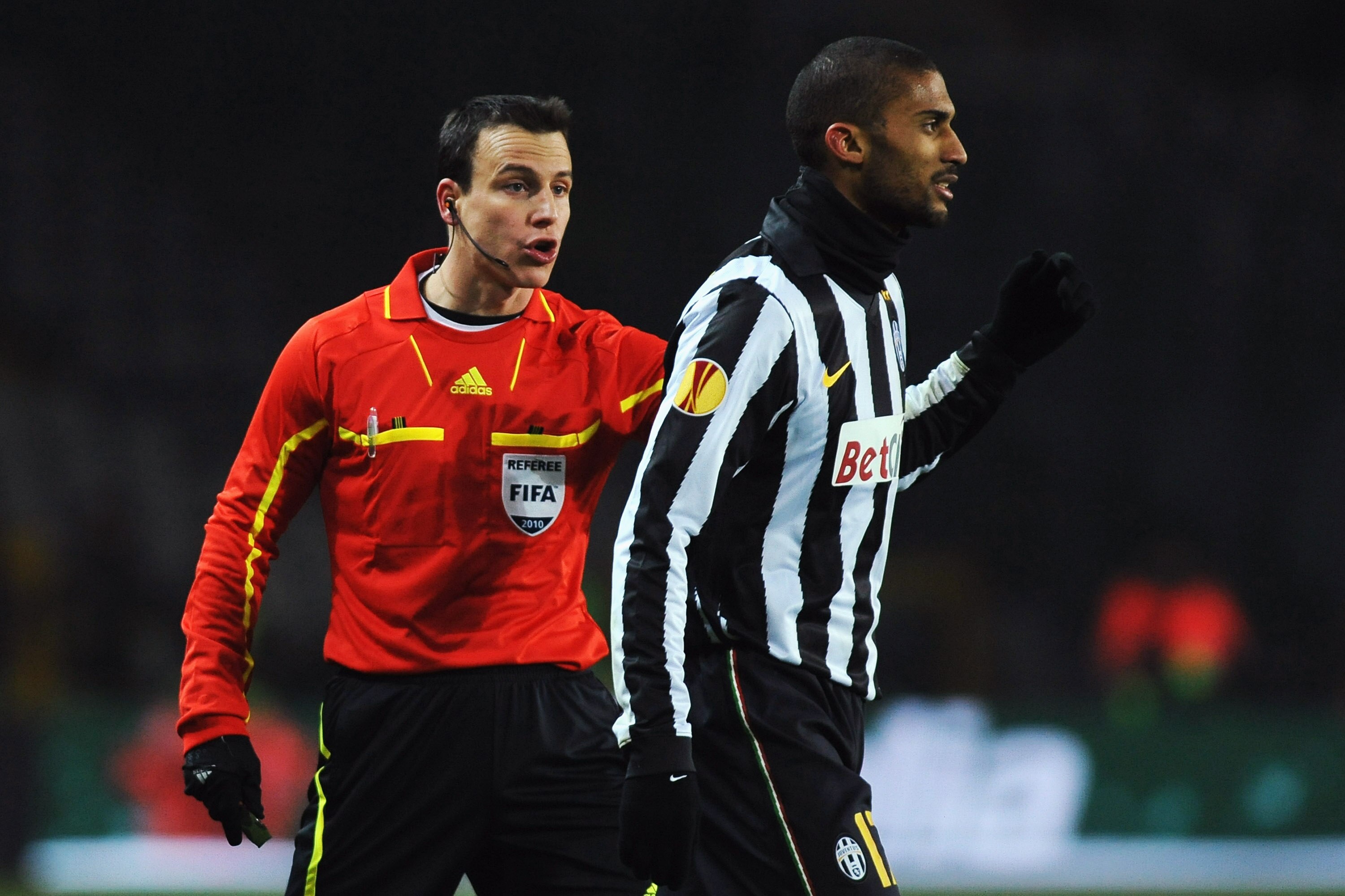 TURIN, ITALY - DECEMBER 16:  Armand Traore of Juventus FC reacts with referee Istvan Vad during the UEFA Europa League group A match between Juventus FC and Manchester City at Stadio Olimpico di Torino on December 16, 2010 in Turin, Italy.  (Photo by Vale