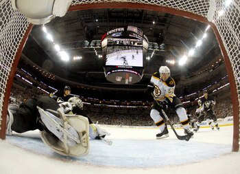 PITTSBURGH, PA - JANUARY 10:  Brad Marchand #63 of the Boston Bruins scores past Marc-Andre Fleury #29 of the Pittsburgh Penguins on January 10, 2011 at Consol Energy Center in Pittsburgh, Pennsylvania.  The Bruins defeated the Penguins 4-2.  (Photo by Ju