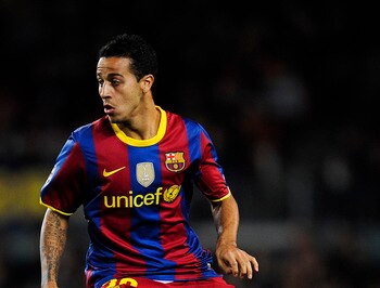 BARCELONA, SPAIN - DECEMBER 07:  Thiago Alcantara of Barcelona runs with the ball during the Champions League match between Barcelona and Rubin Kazan at Camp Nou Stadium on December 7, 2010 in Barcelona, Spain. Barcelona won 2-0.  (Photo by David Ramos/Ge